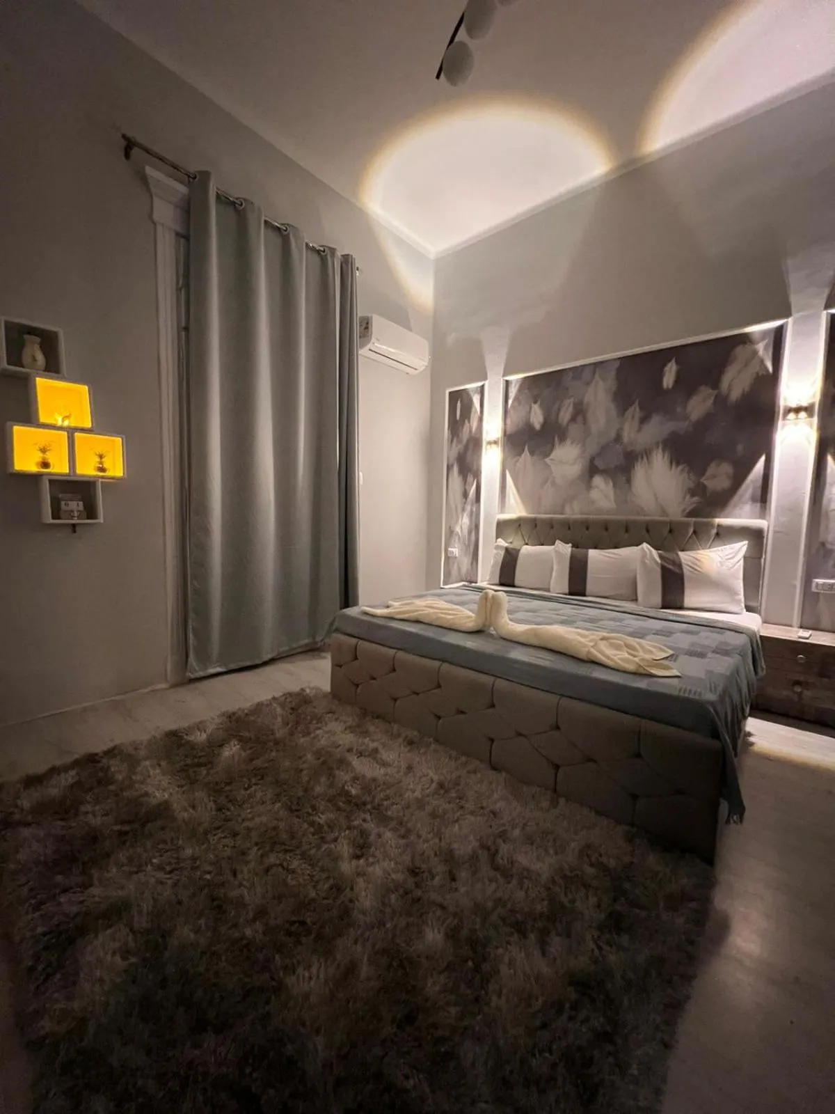 Photo of the whole room, Bed in downtown Family Suites