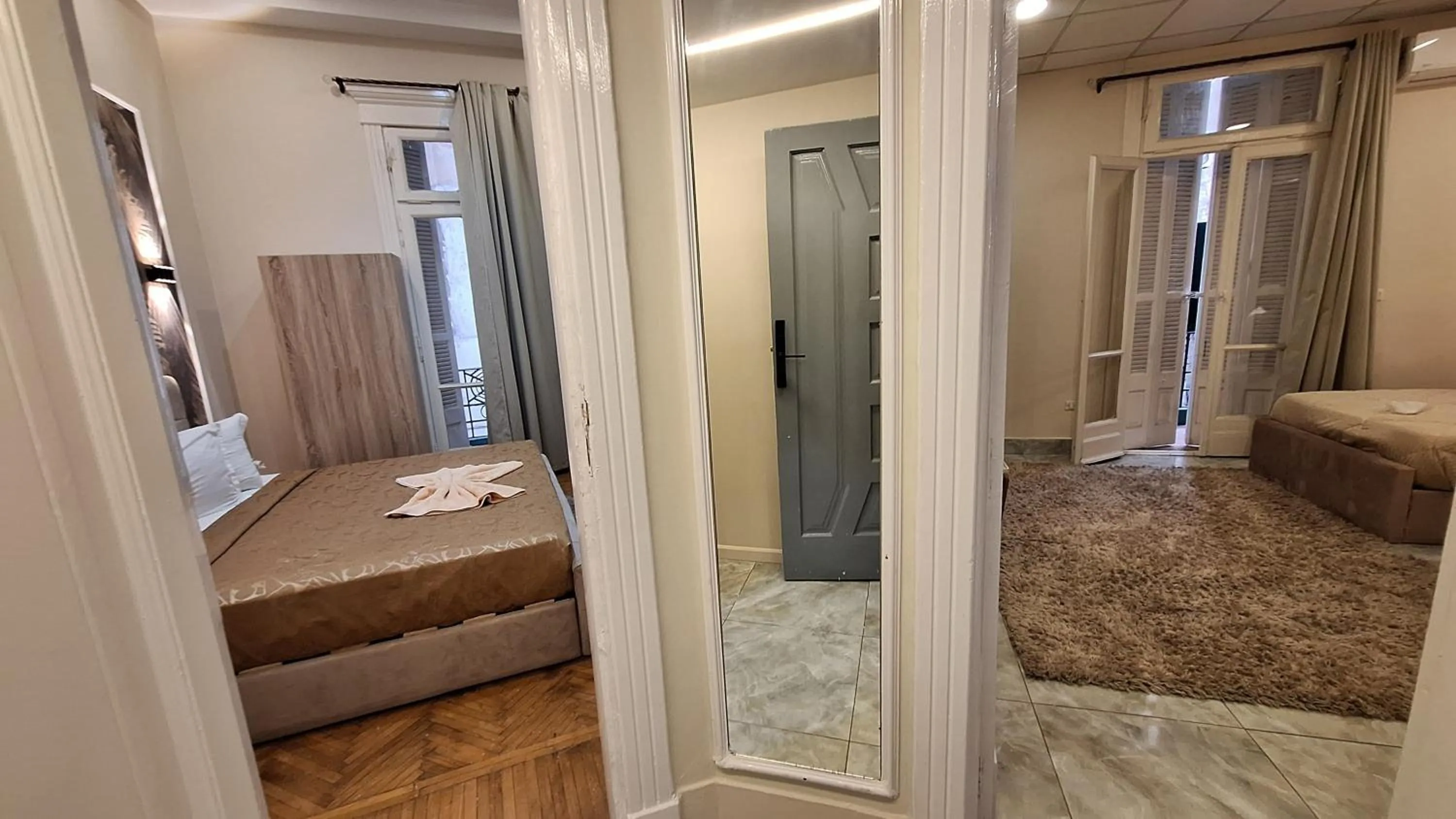 Photo of the whole room, Bed in downtown Family Suites