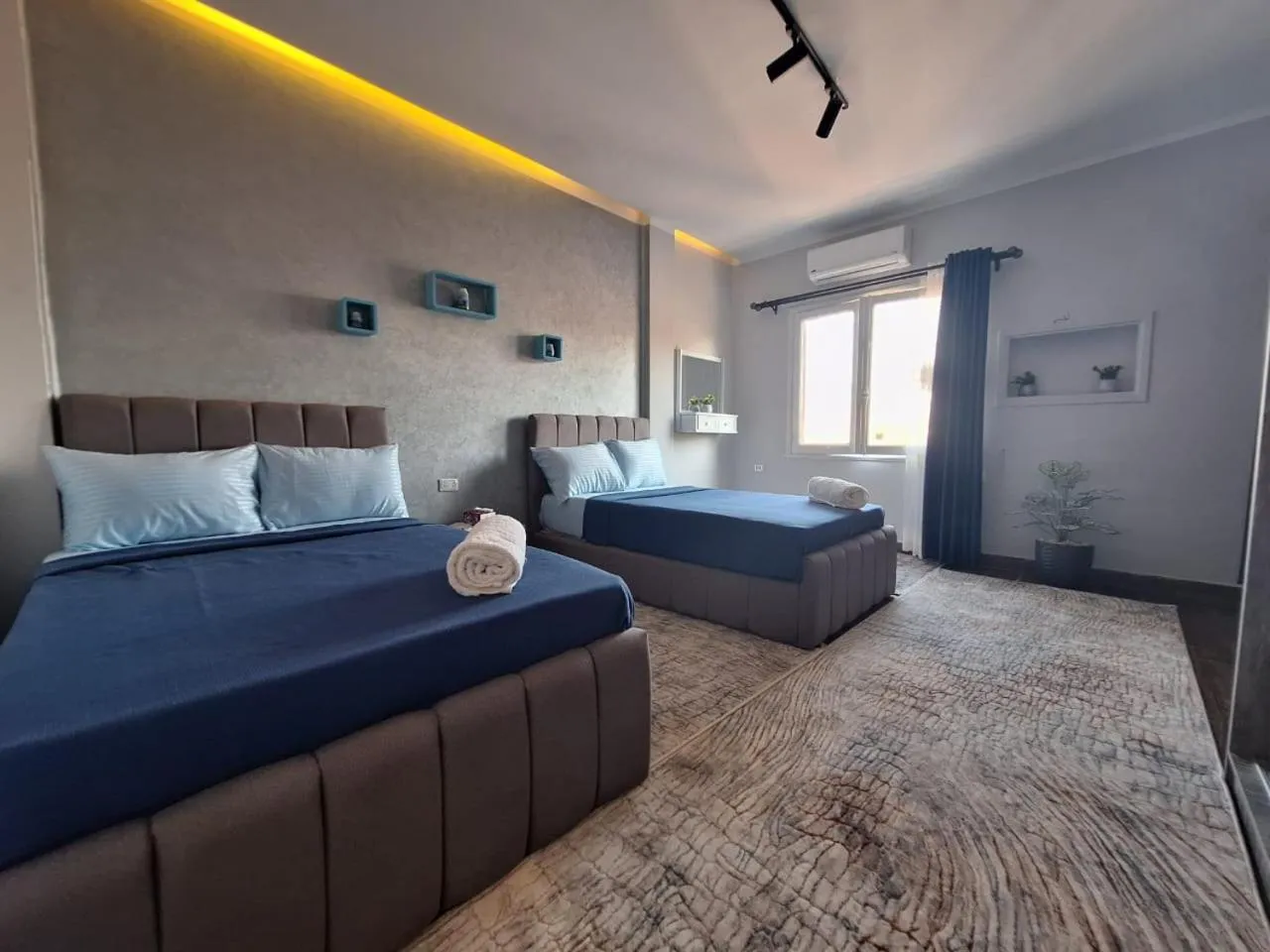 Bedroom, Bed in downtown Family Suites