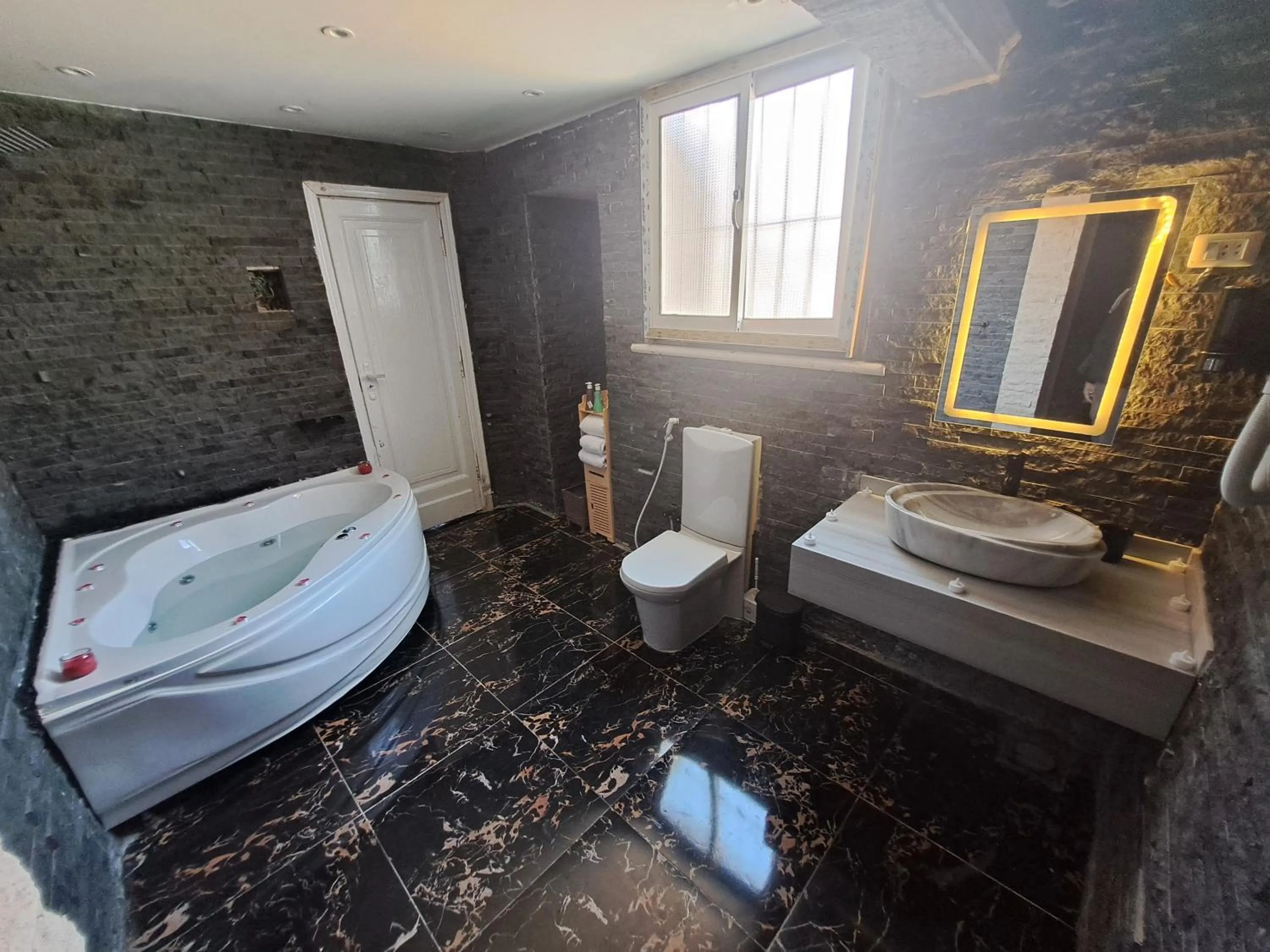 Bathroom in downtown Family Suites