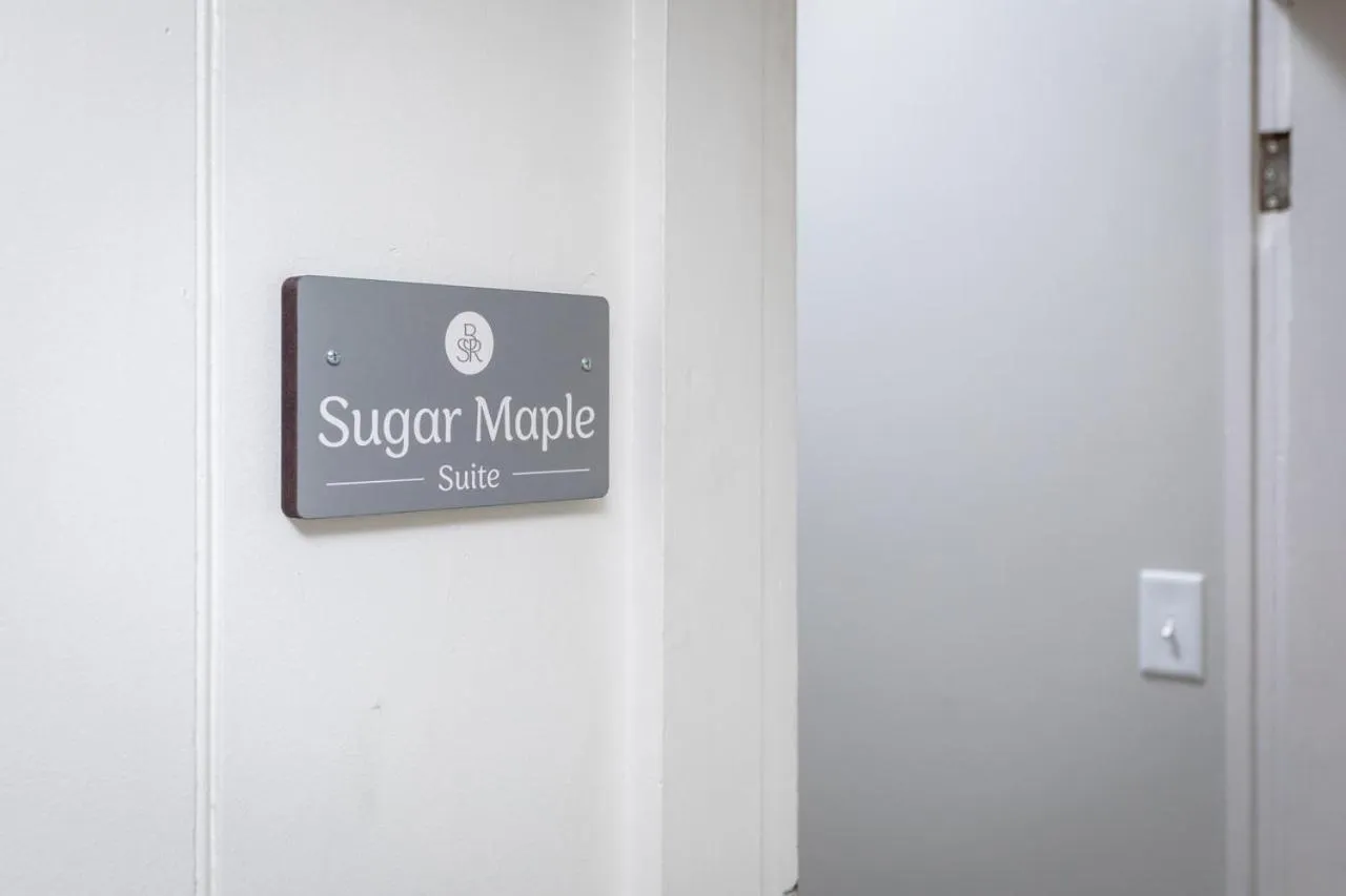 Logo/Certificate/Sign in By the Side of the Road Inn & Cottages