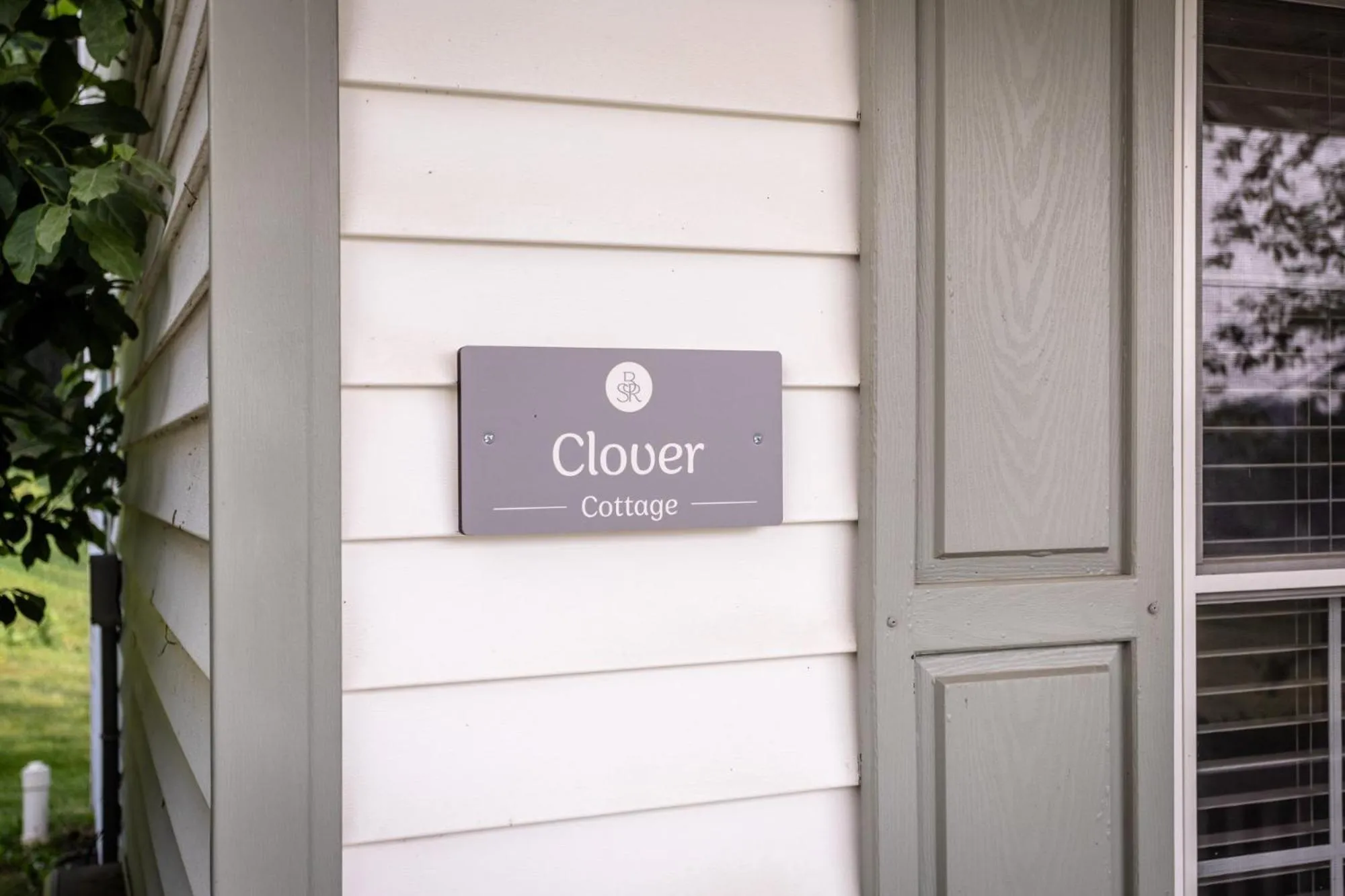 Logo/Certificate/Sign in By the Side of the Road Inn & Cottages