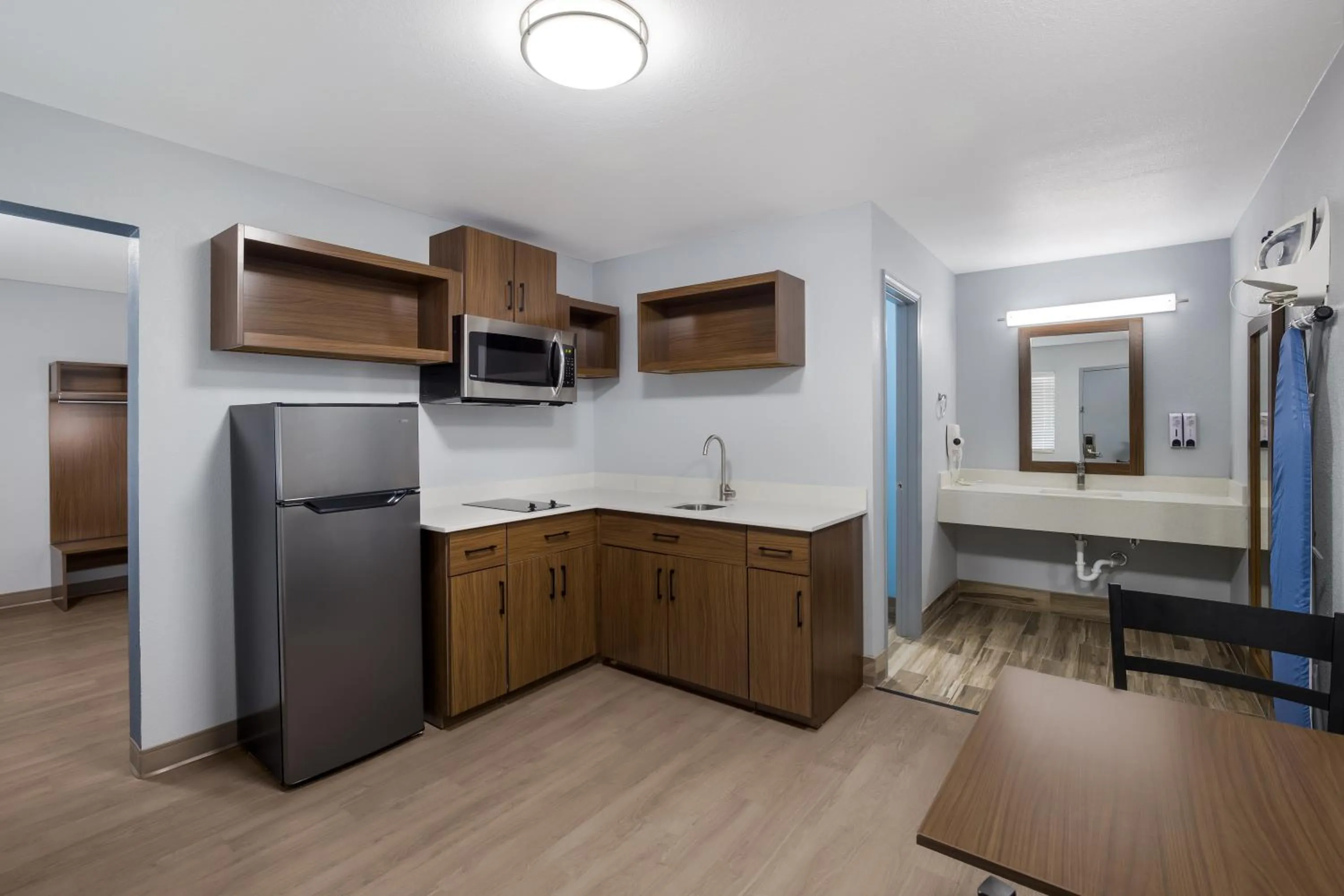 Kitchen or kitchenette in HomeTowne Studios by Red Roof Orange, TX