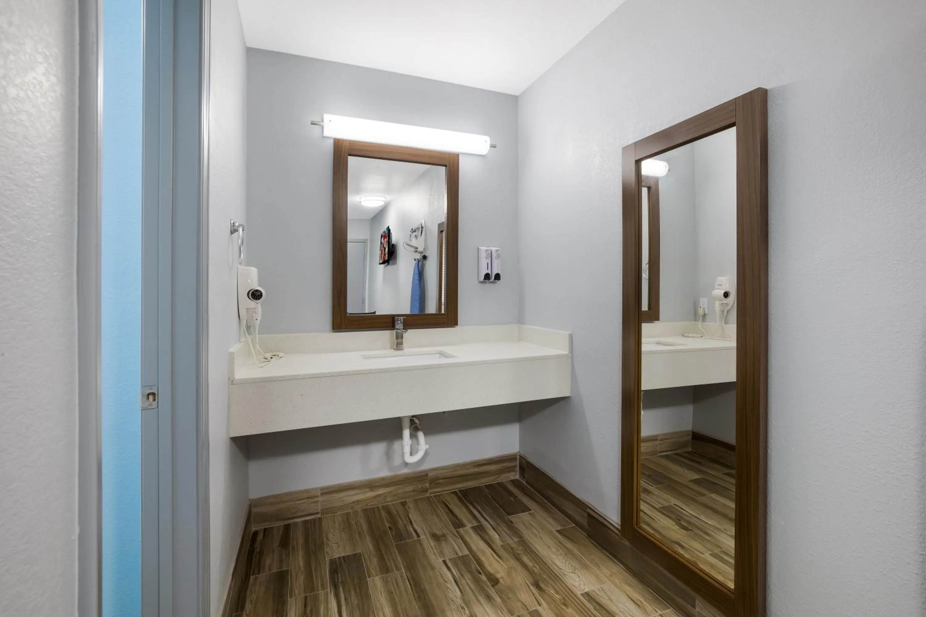 Bathroom in HomeTowne Studios by Red Roof Orange, TX