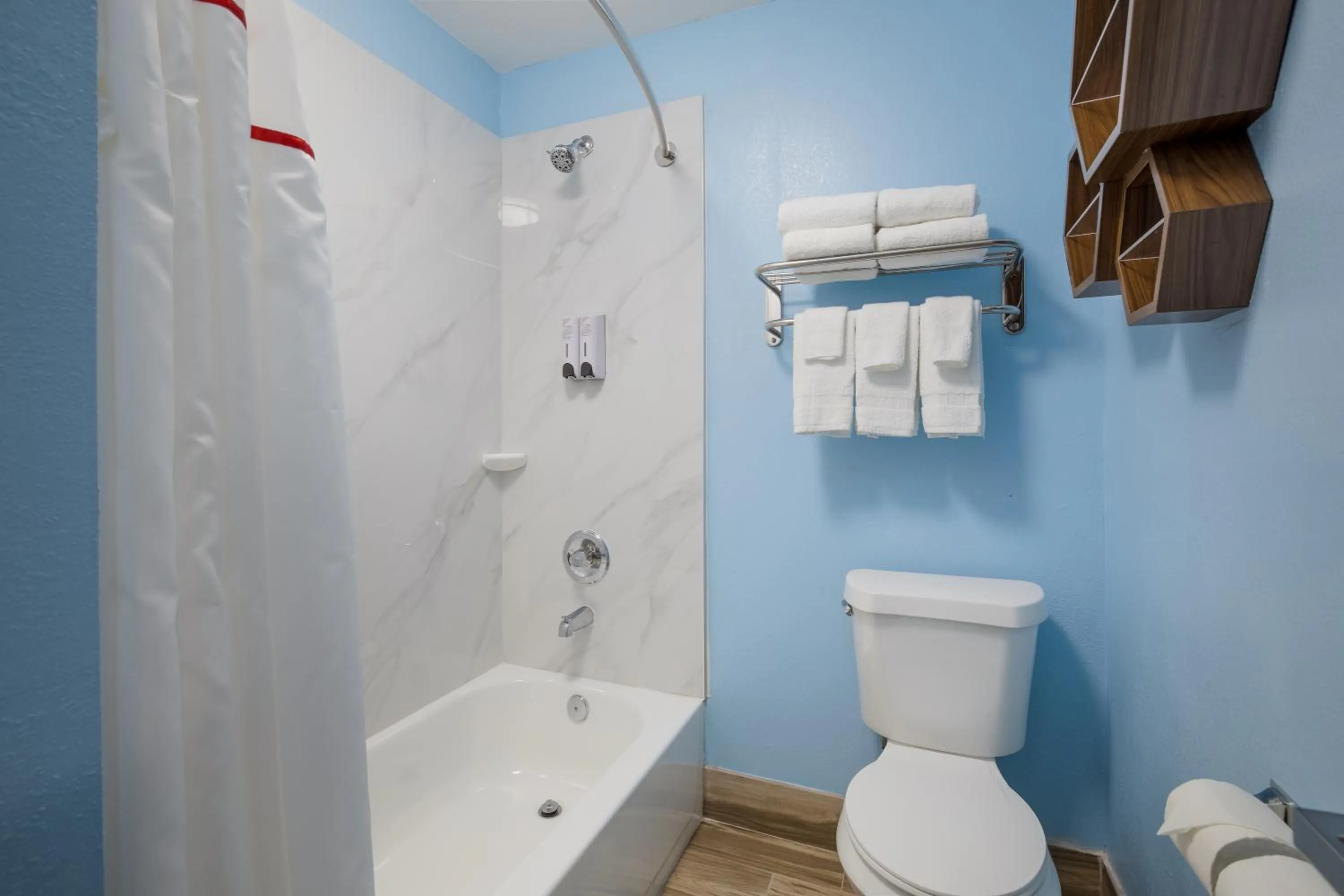 Bathroom in HomeTowne Studios by Red Roof Orange, TX