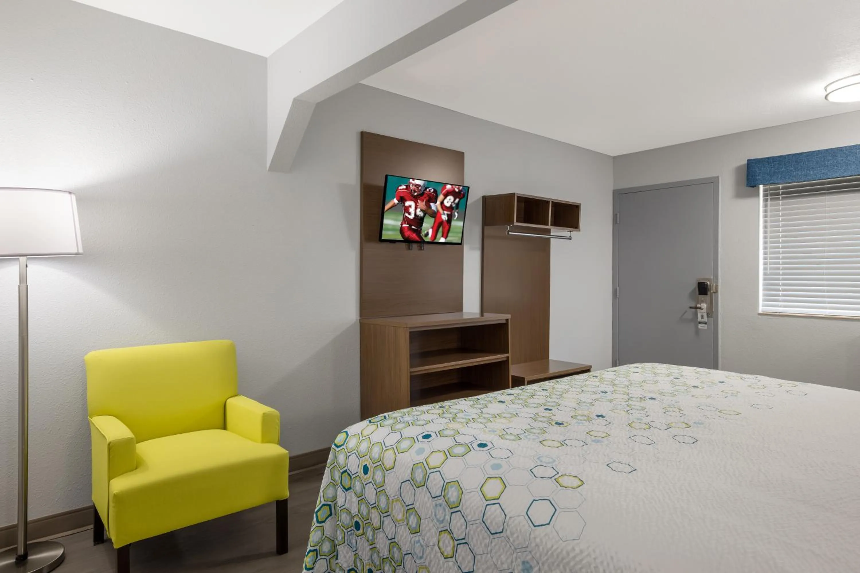 Bedroom, Bed in HomeTowne Studios by Red Roof Orange, TX