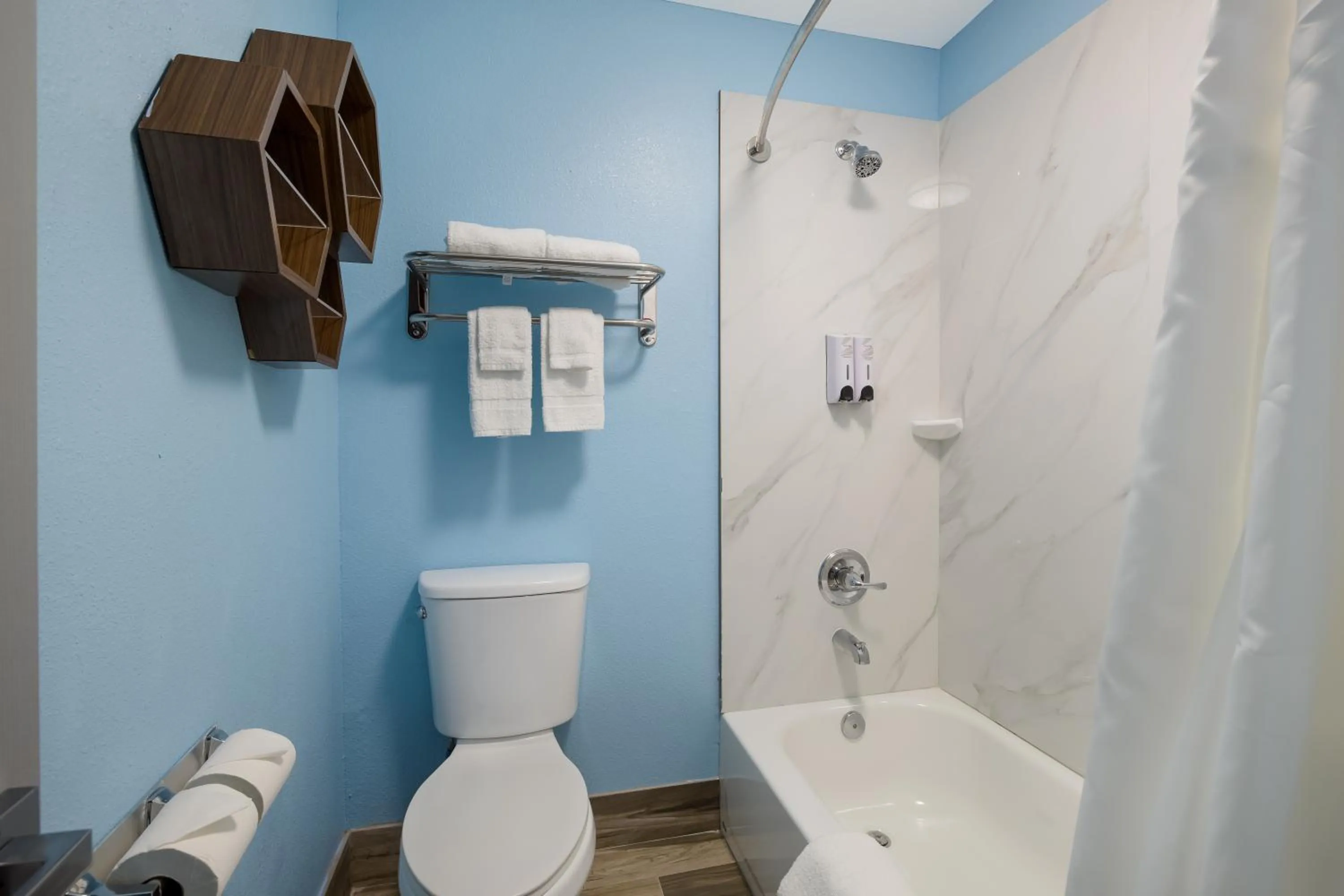 Bathroom in HomeTowne Studios by Red Roof Orange, TX