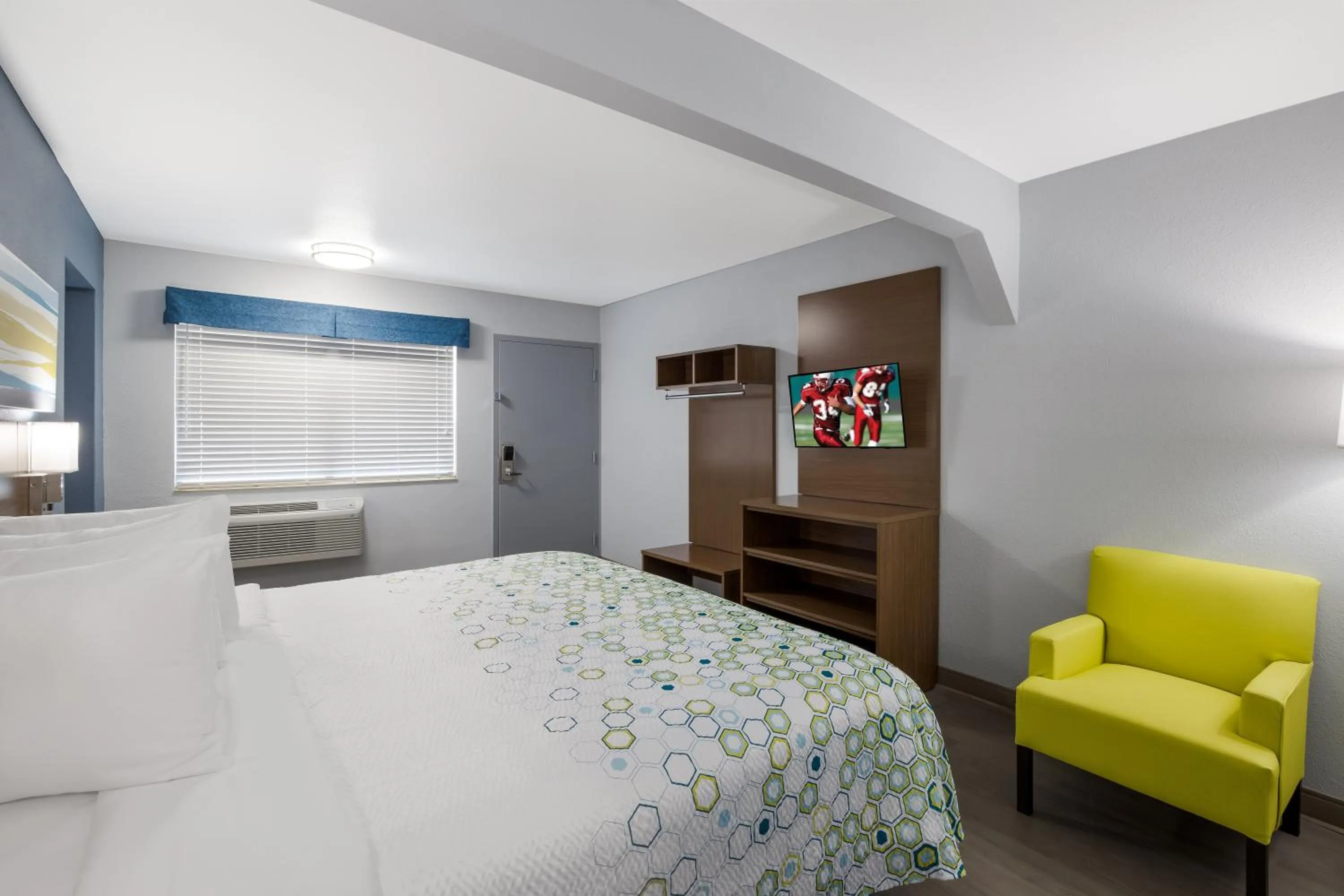 Bedroom, Bed in HomeTowne Studios by Red Roof Orange, TX