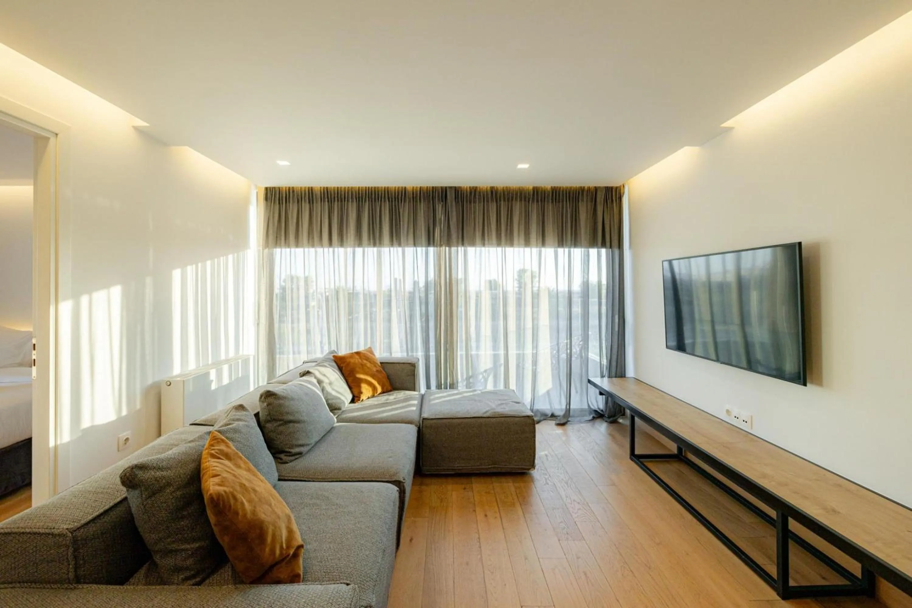 TV and multimedia in Earth Boutique Apartments next to Stavros Niarchos