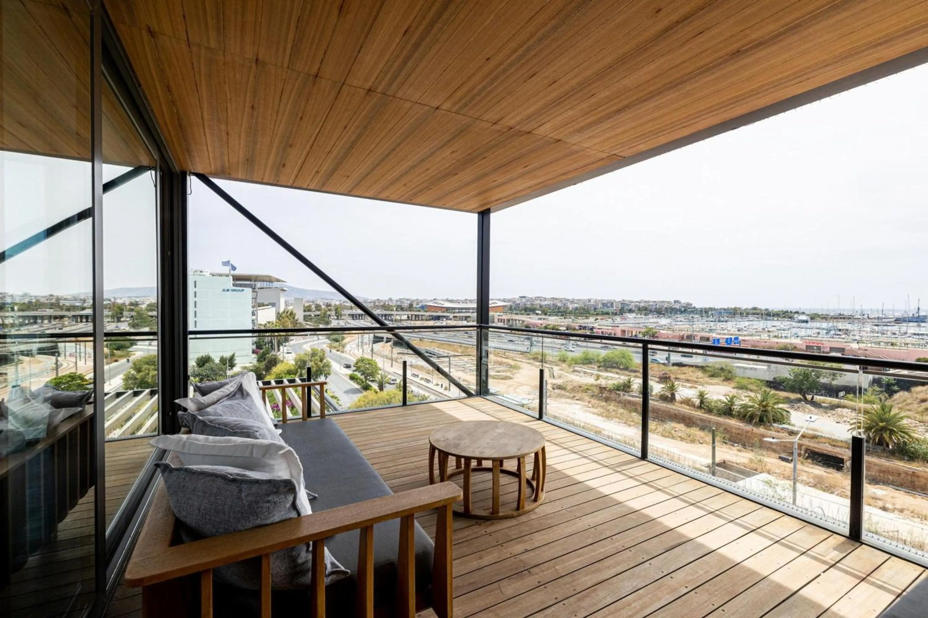 Day in Earth Boutique Apartments next to Stavros Niarchos