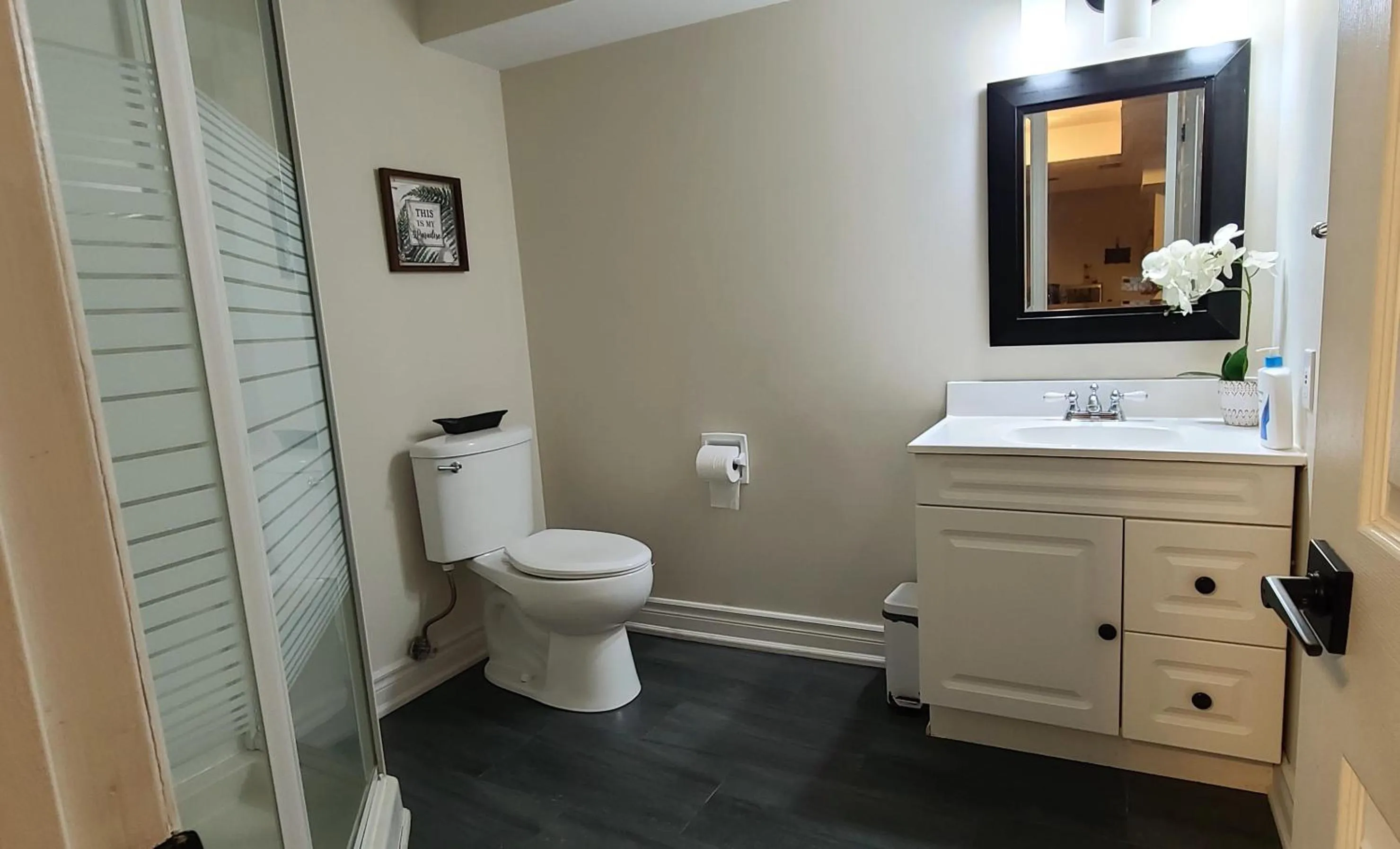 Bathroom in Spacious and bright unit with natural light.