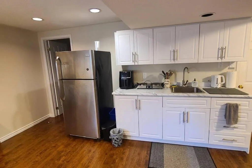 Kitchen or kitchenette in Spacious and bright unit with natural light.