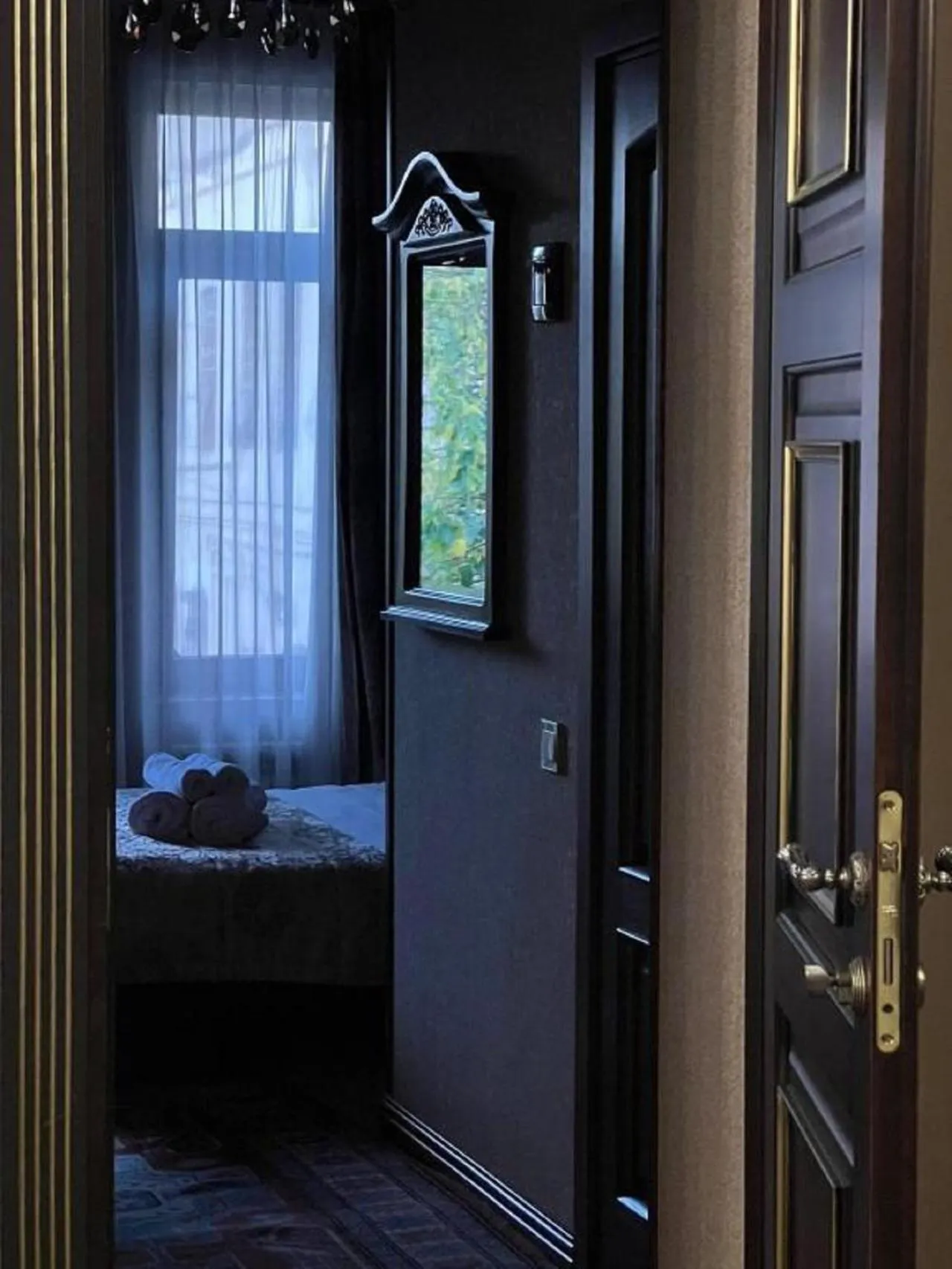 Bed in Royal Antique Boutique Hotel