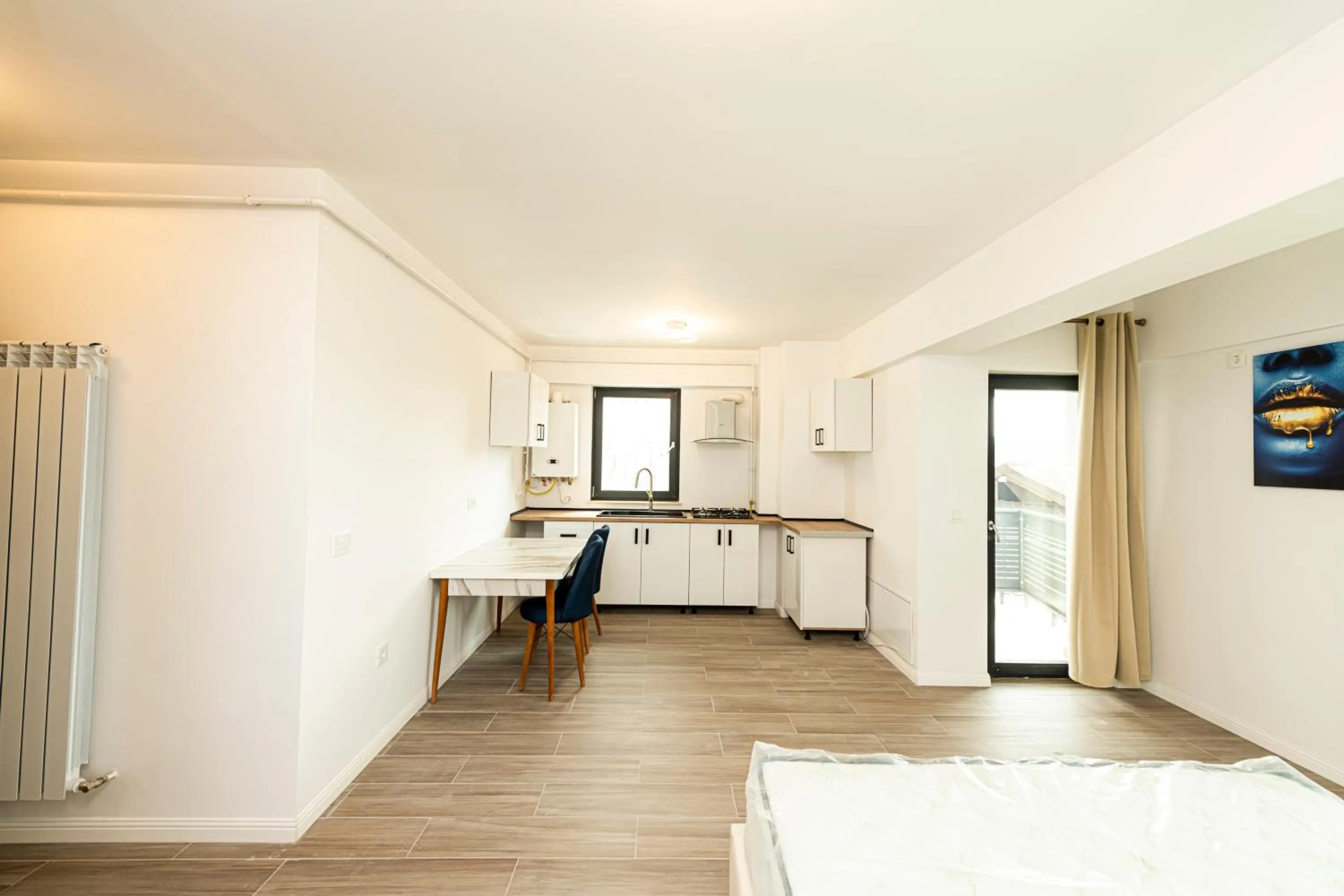 Kitchen or kitchenette, Bed in Apart HOTEL Fusion Tower