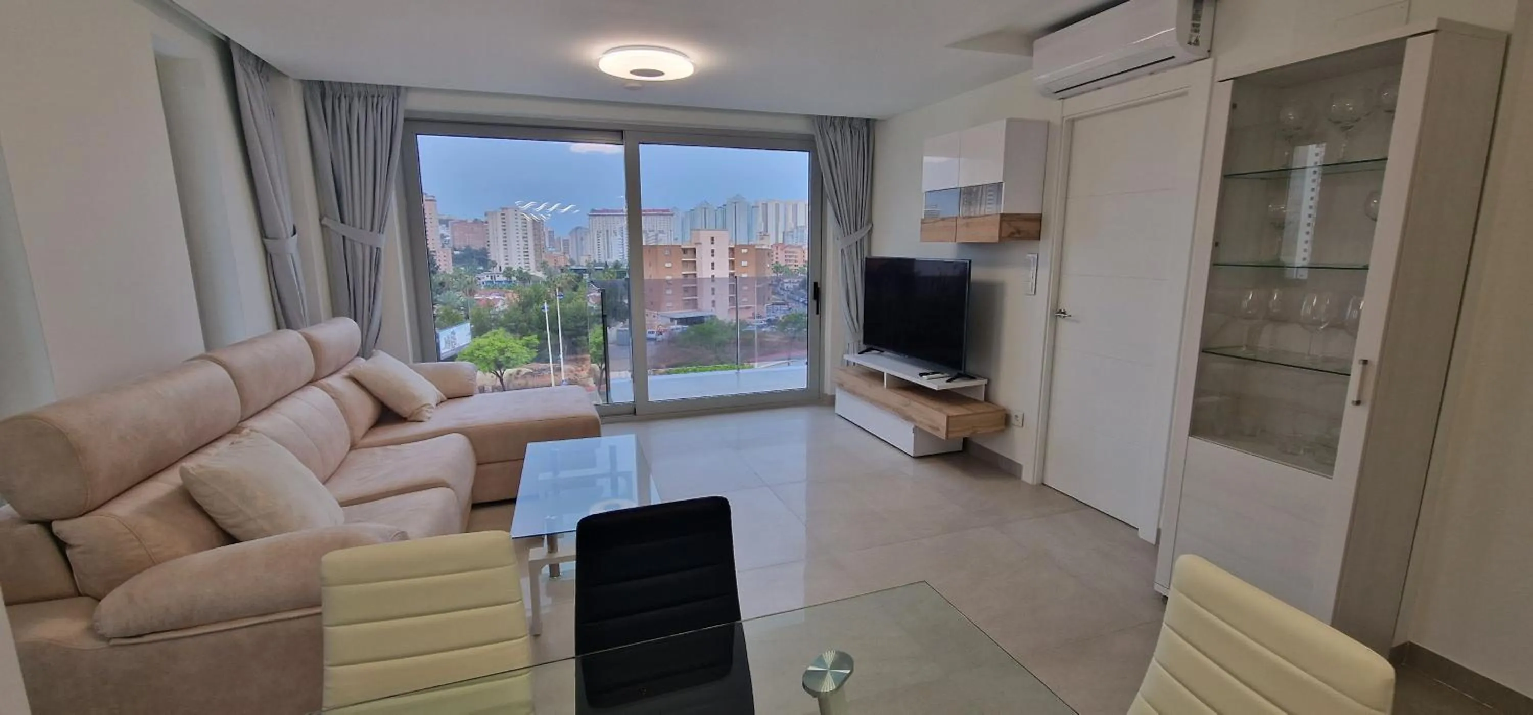 Communal lounge/ TV room in APARTAMENTOS OASIS DE LA CALA