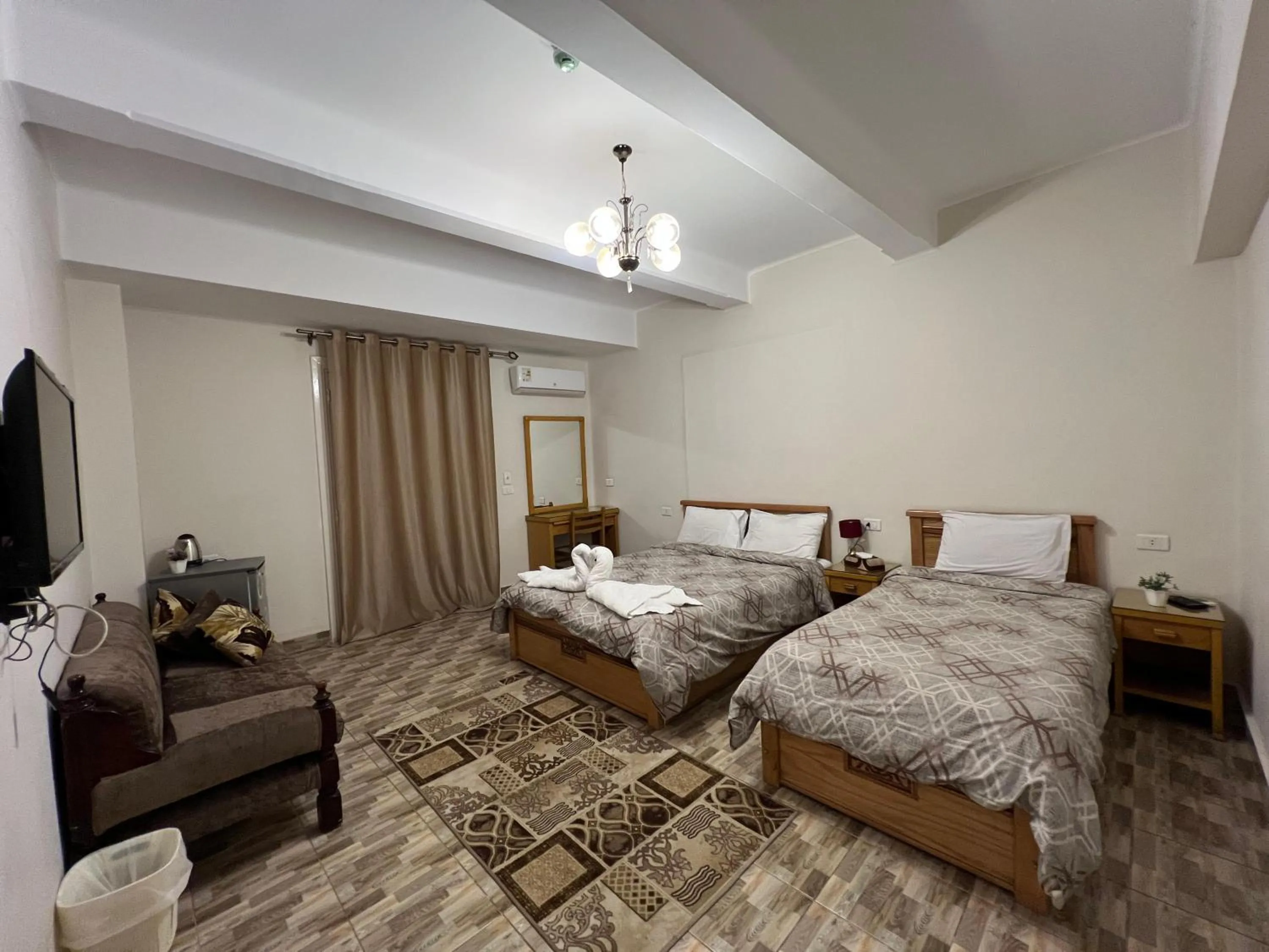 Living room, Bed in Central Cairo Hotel