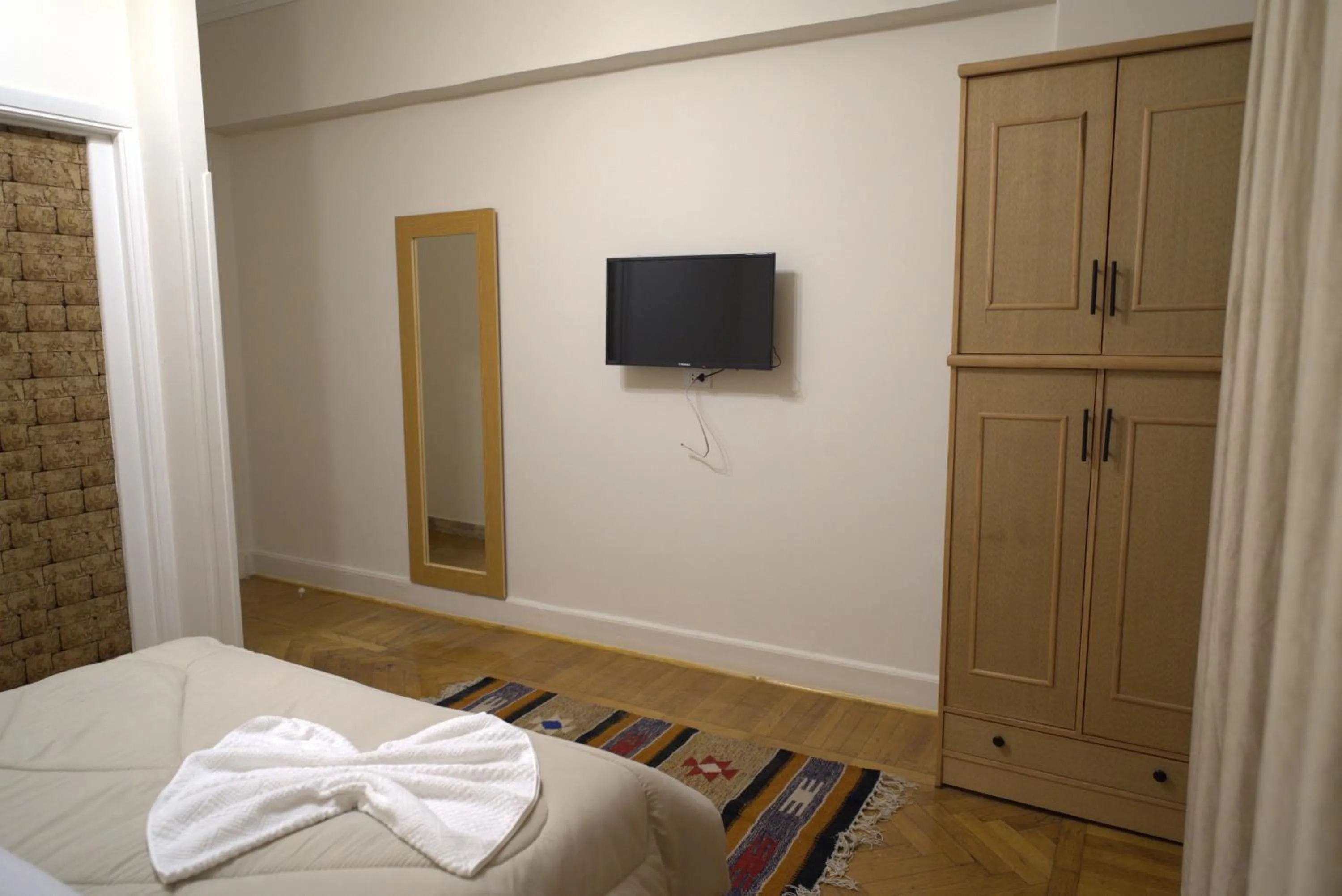 Bed in Central Cairo Hotel