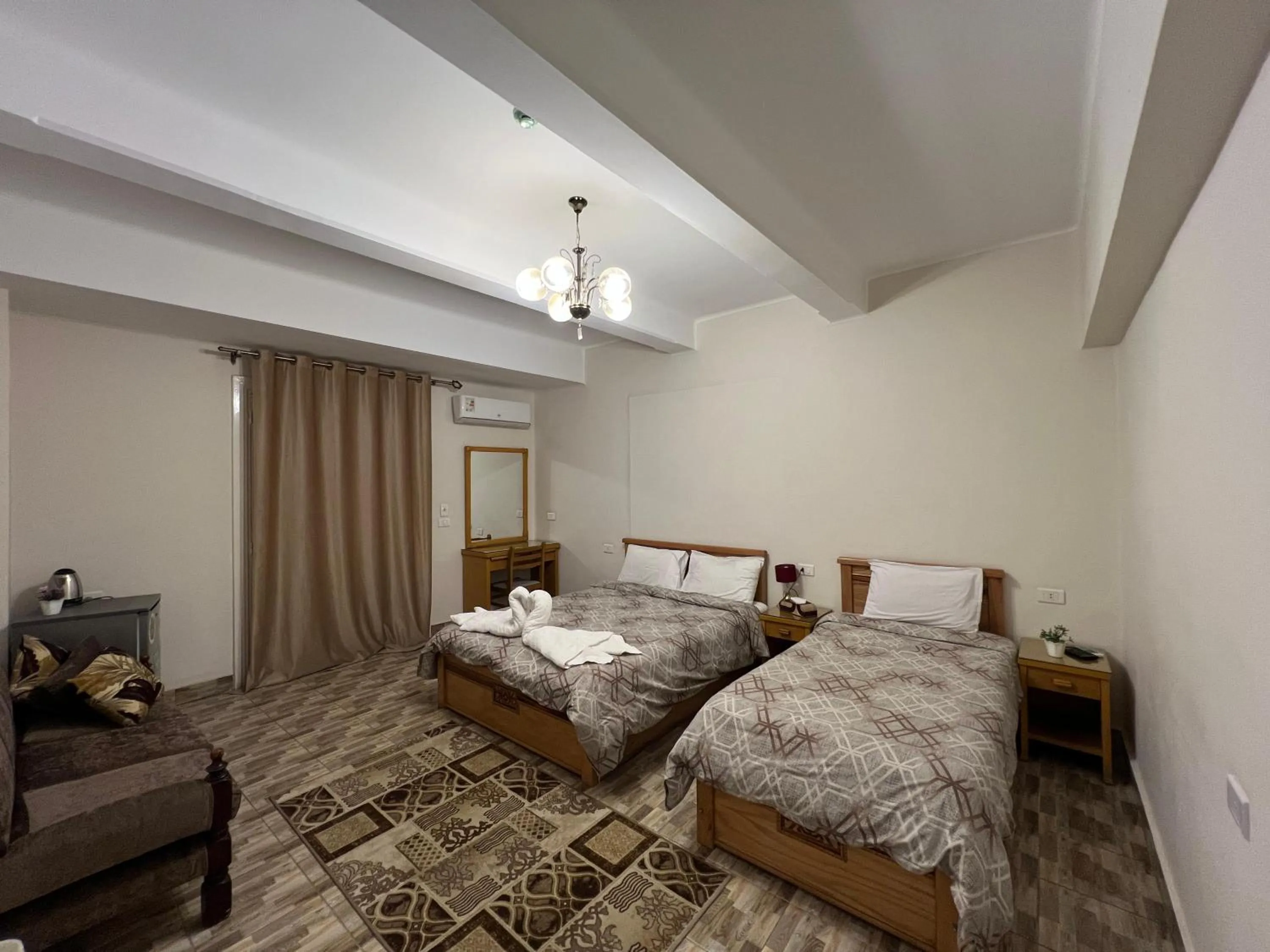 Bed in Central Cairo Hotel