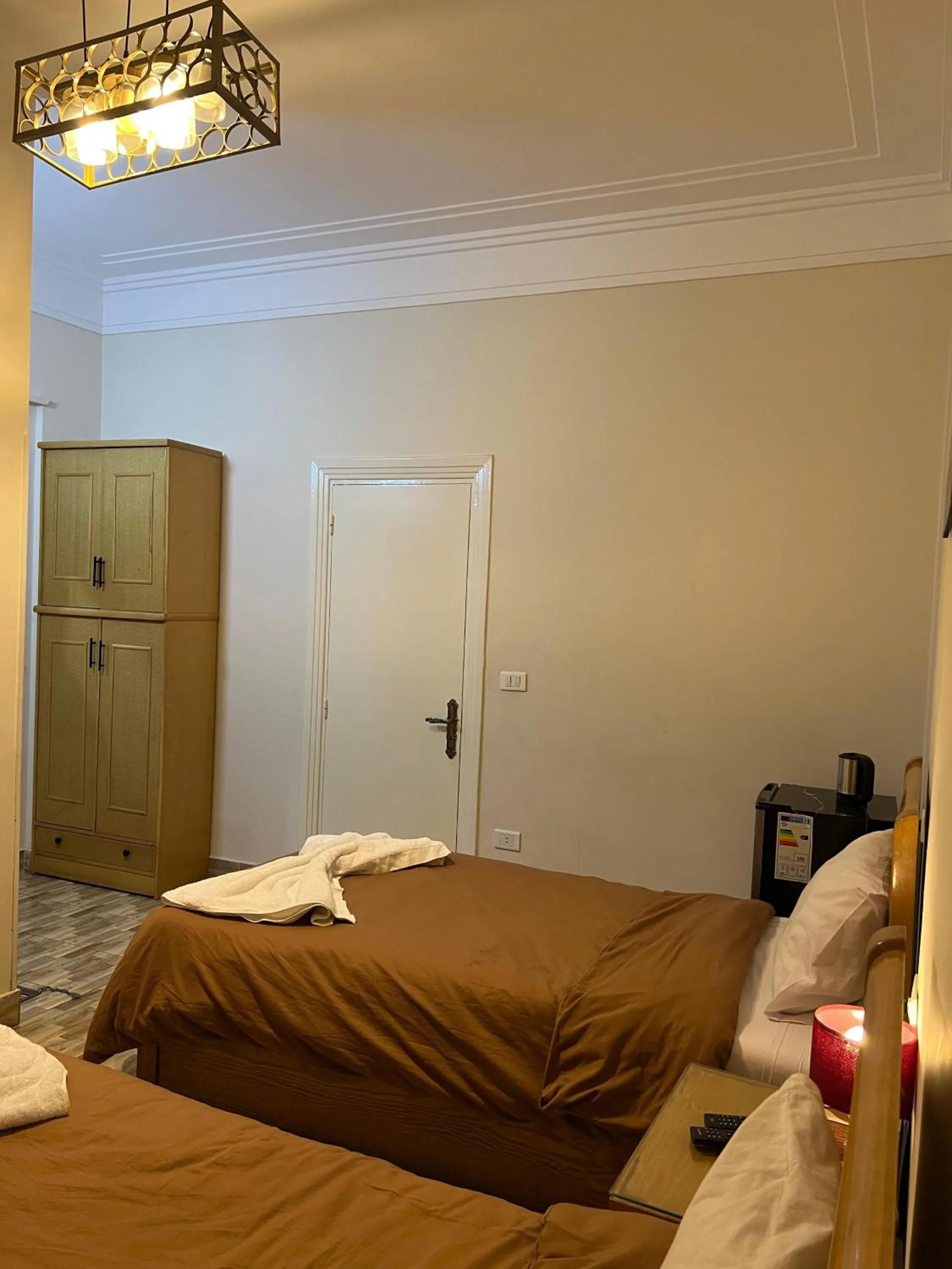 Photo of the whole room, Bed in Central Cairo Hotel