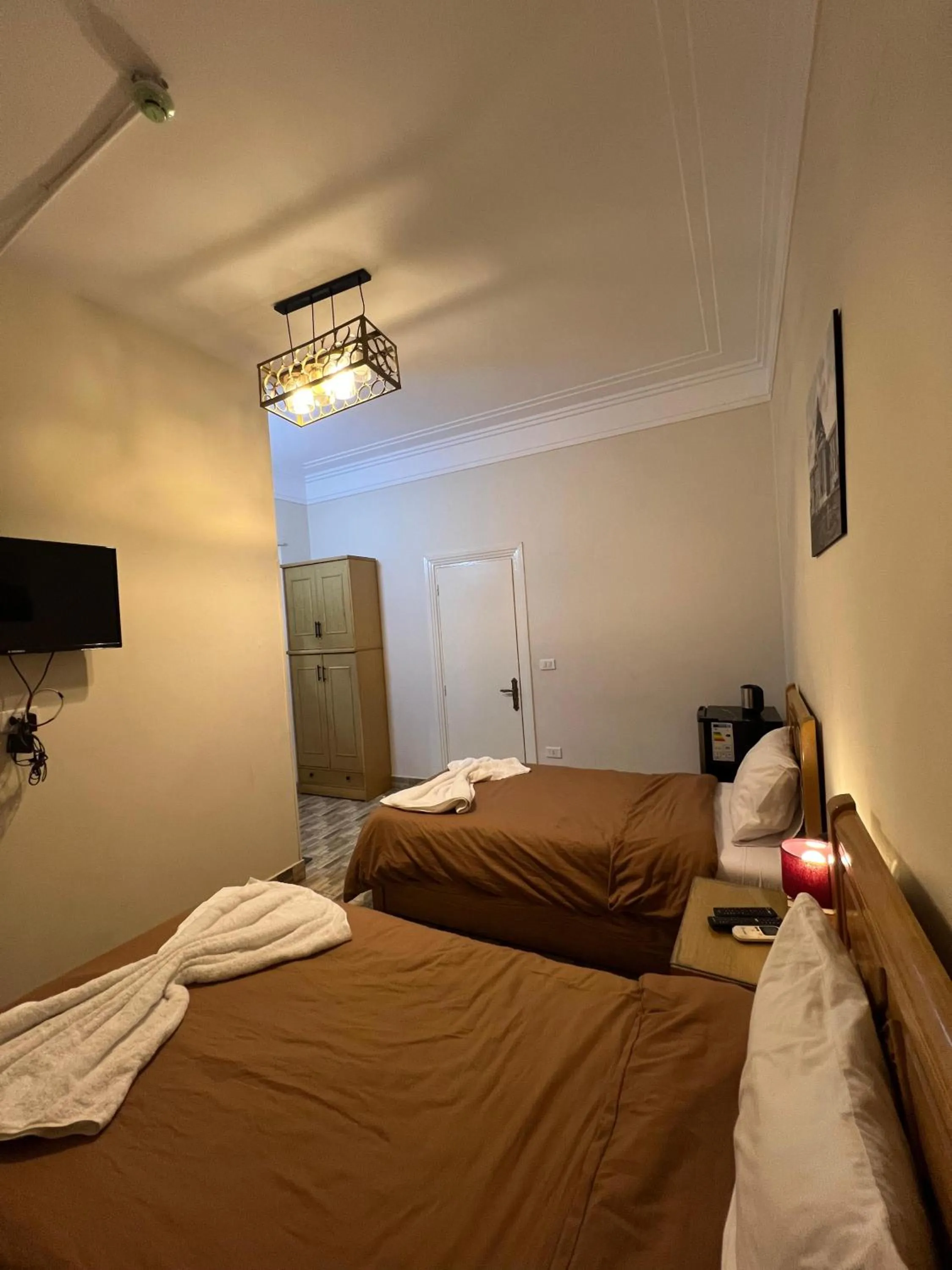 Photo of the whole room, Bed in Central Cairo Hotel