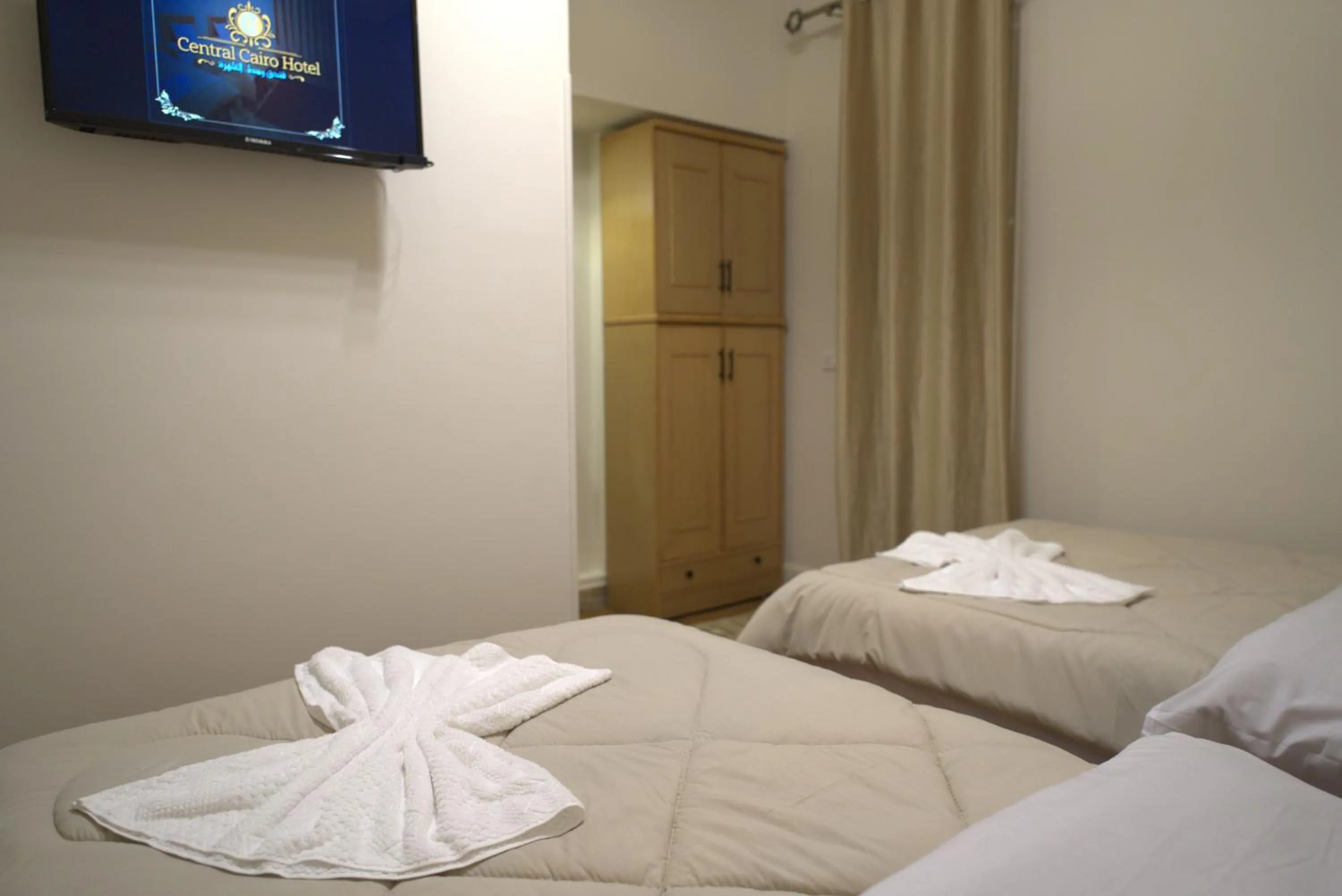 Bed in Central Cairo Hotel