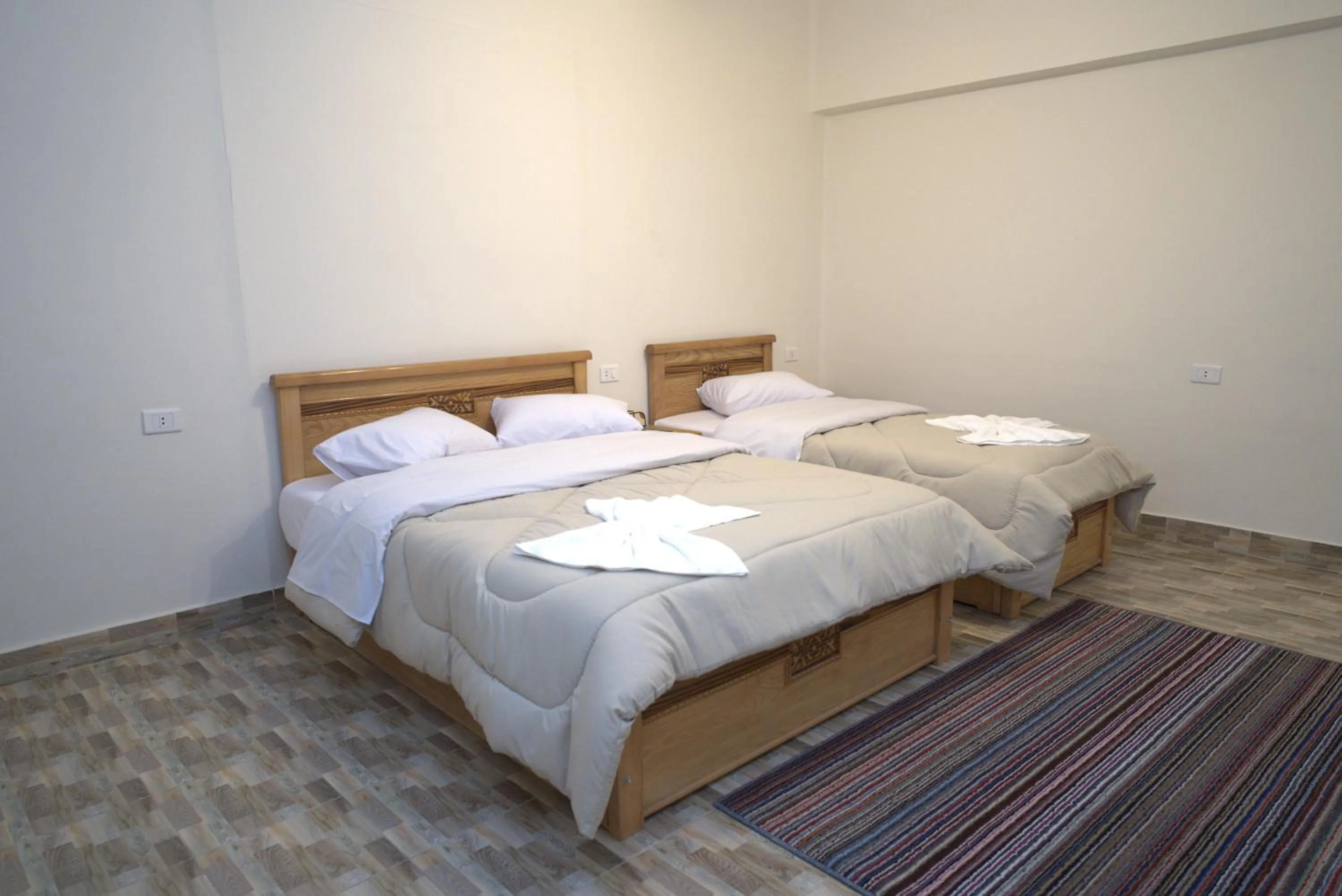 Bed in Central Cairo Hotel