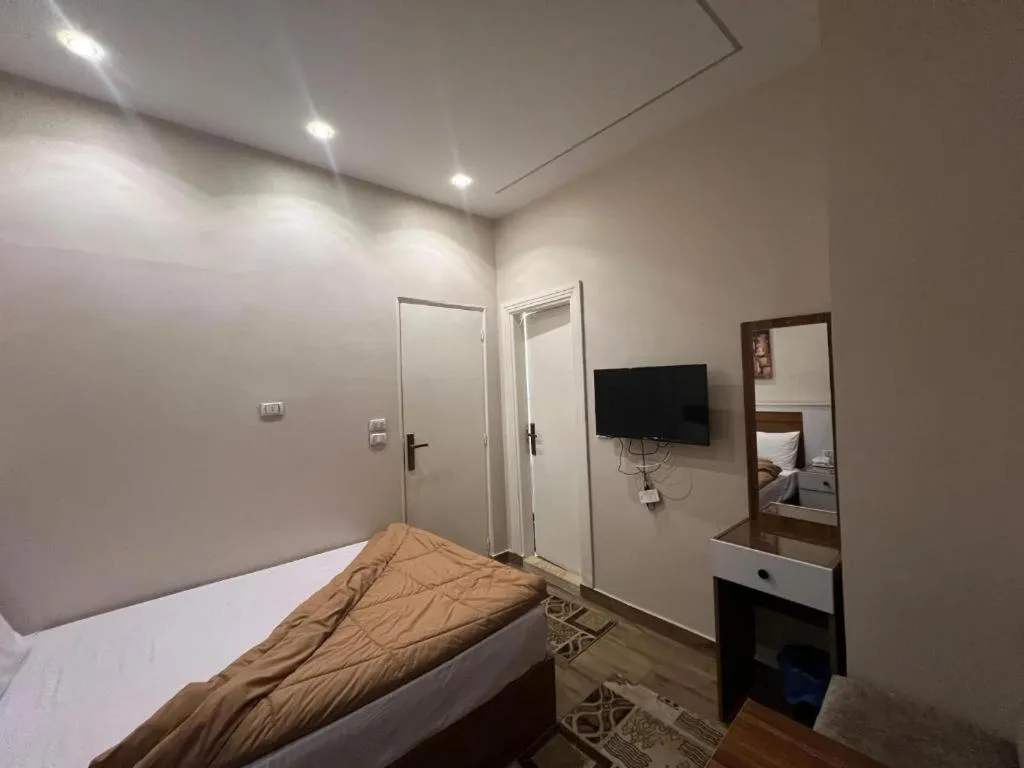 Bed in Central Cairo Hotel