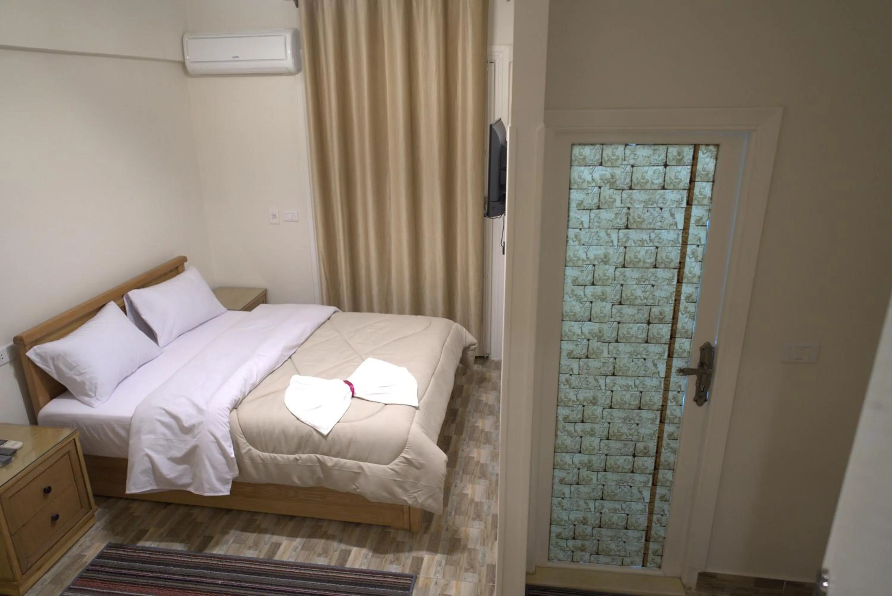 Photo of the whole room, Bed in Central Cairo Hotel