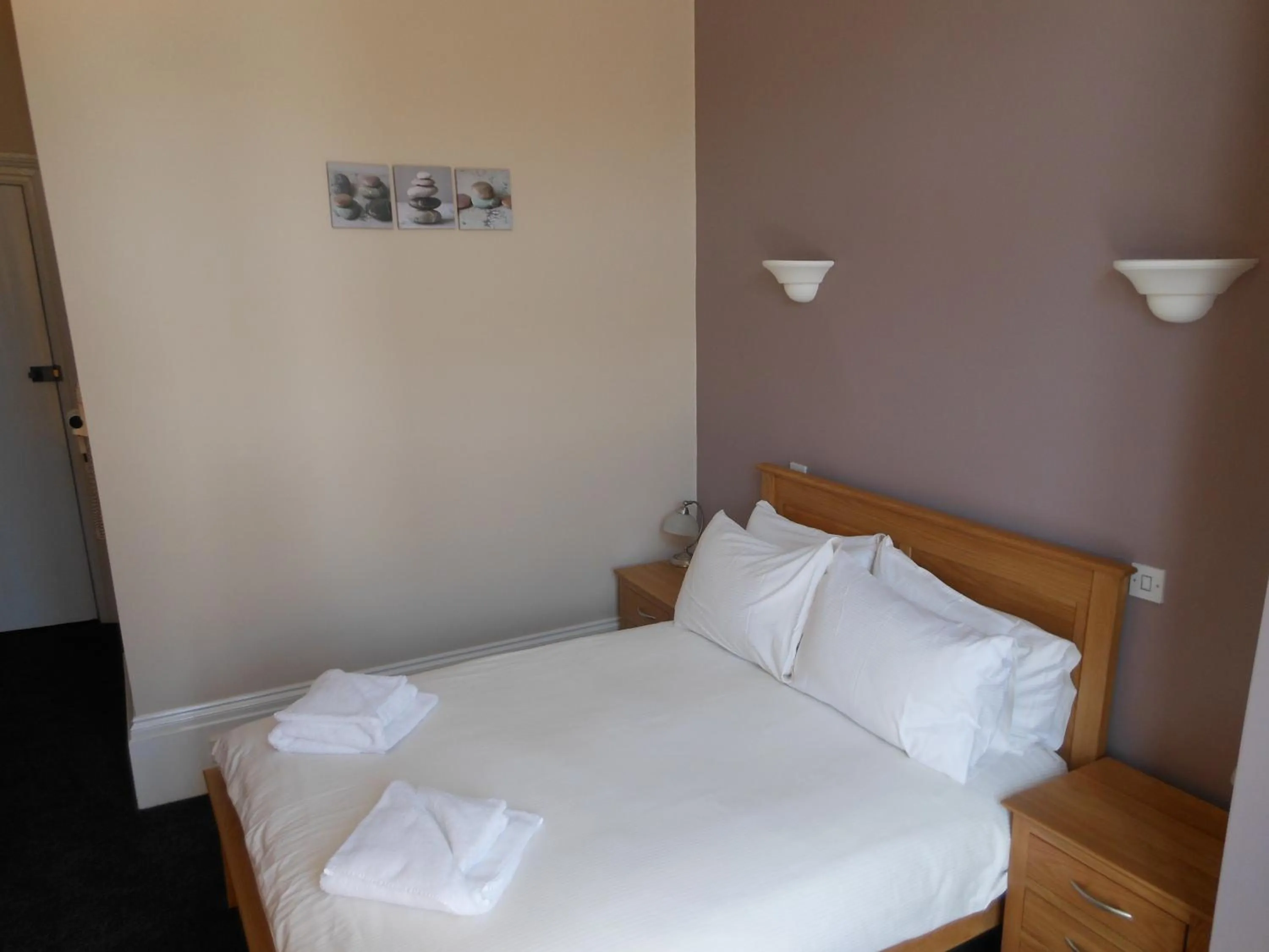 Bed in Bath House Hotel