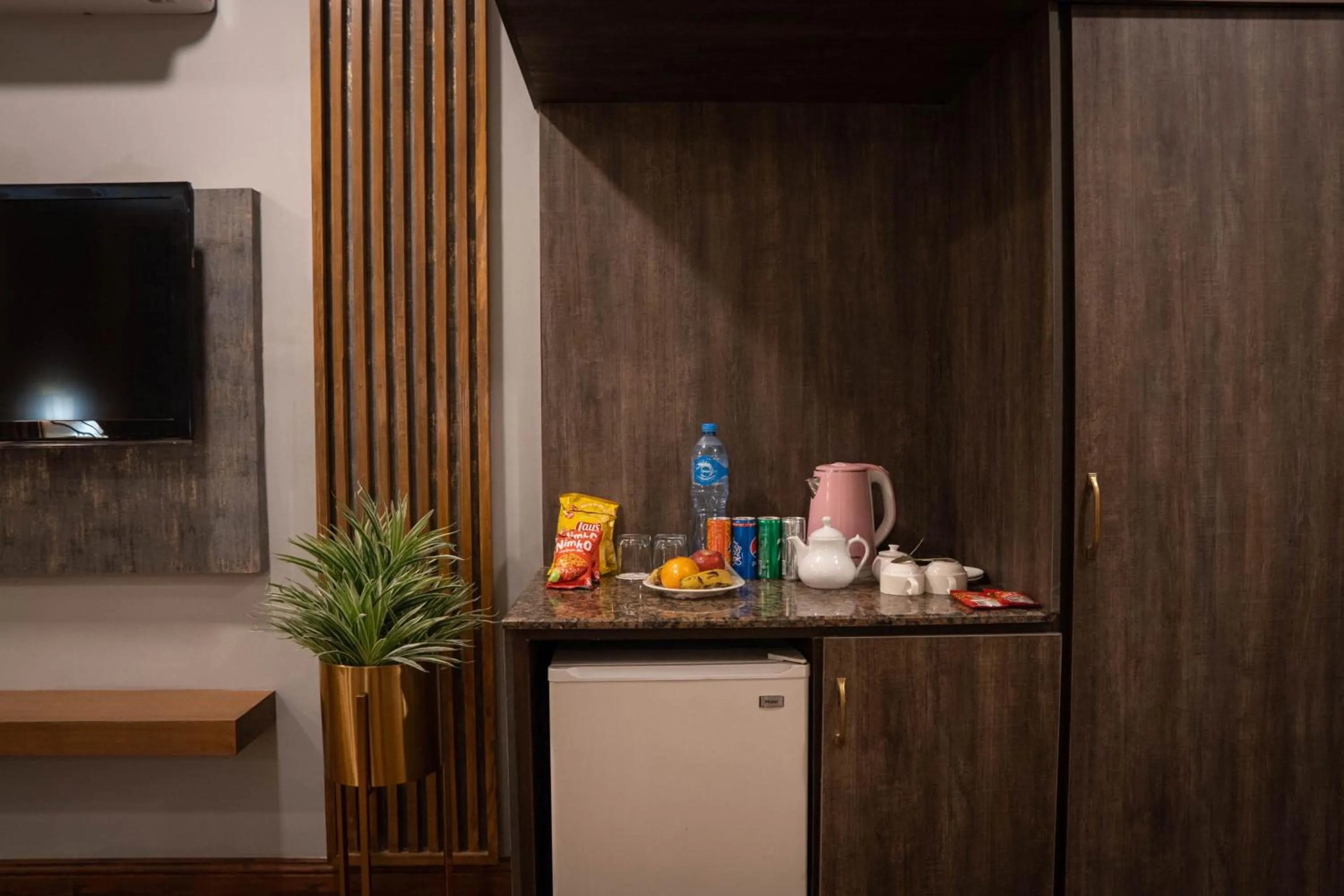 Coffee/tea facilities in Magnum Inn