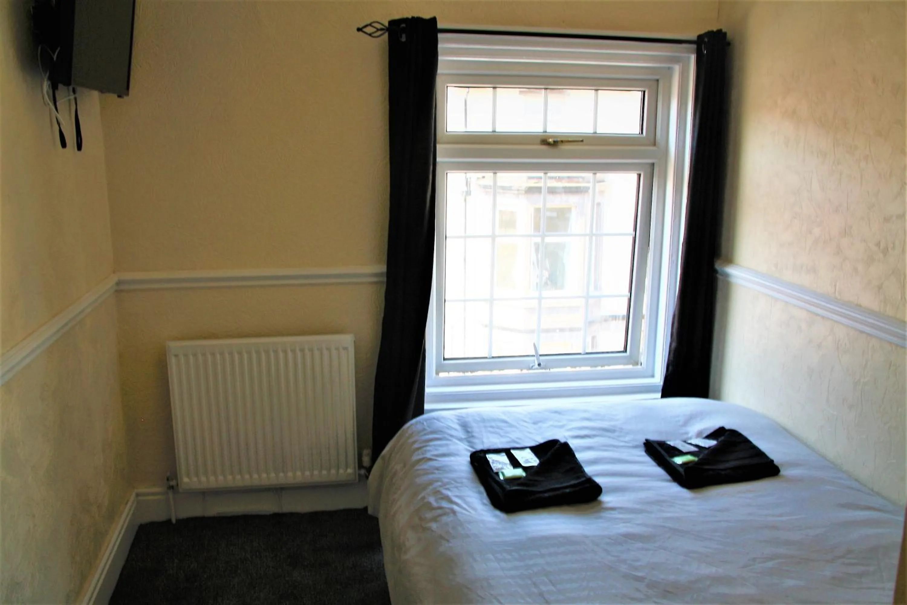 Bed in Pine Lodge Hotel