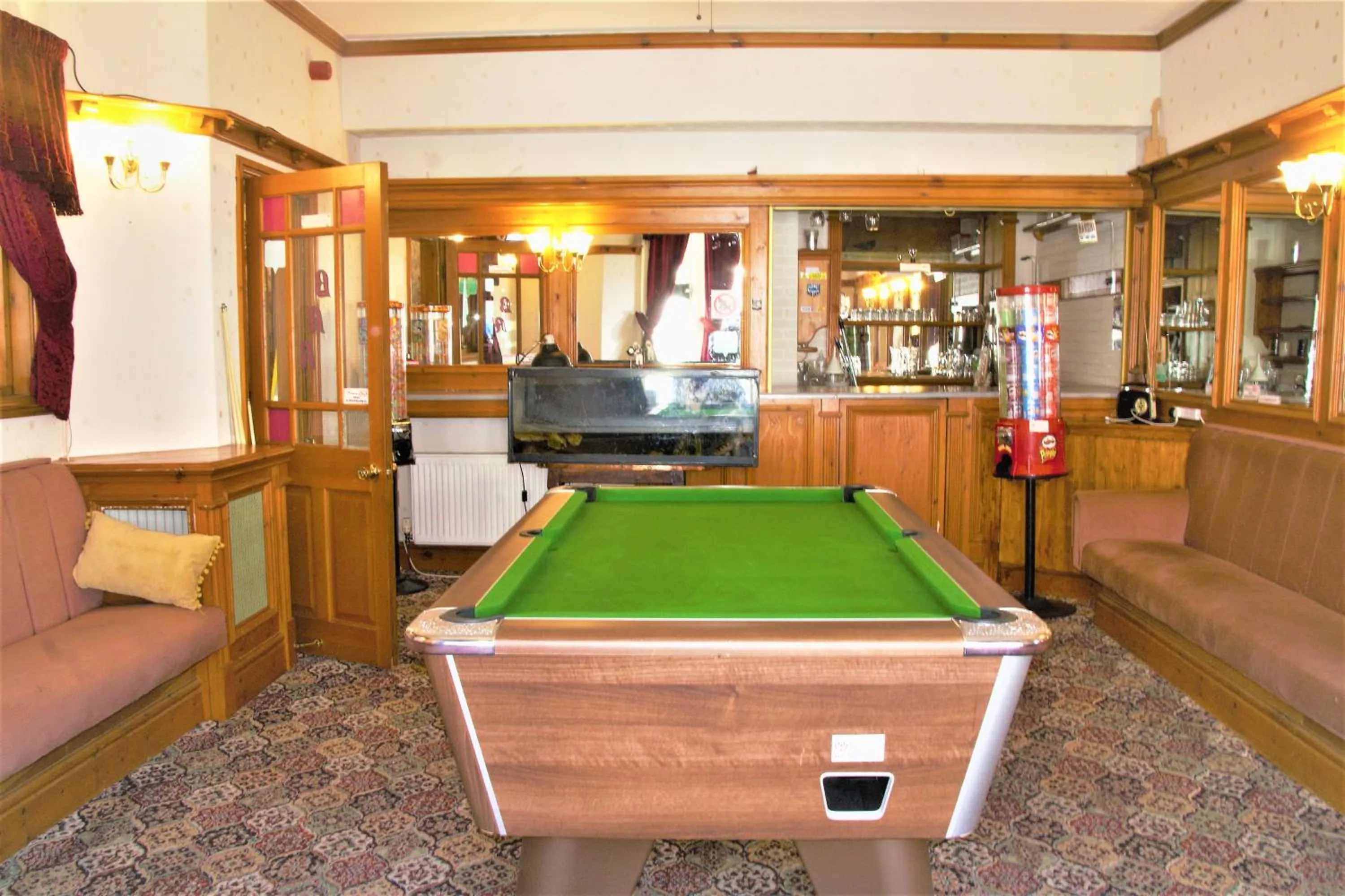 Lounge or bar in Pine Lodge Hotel