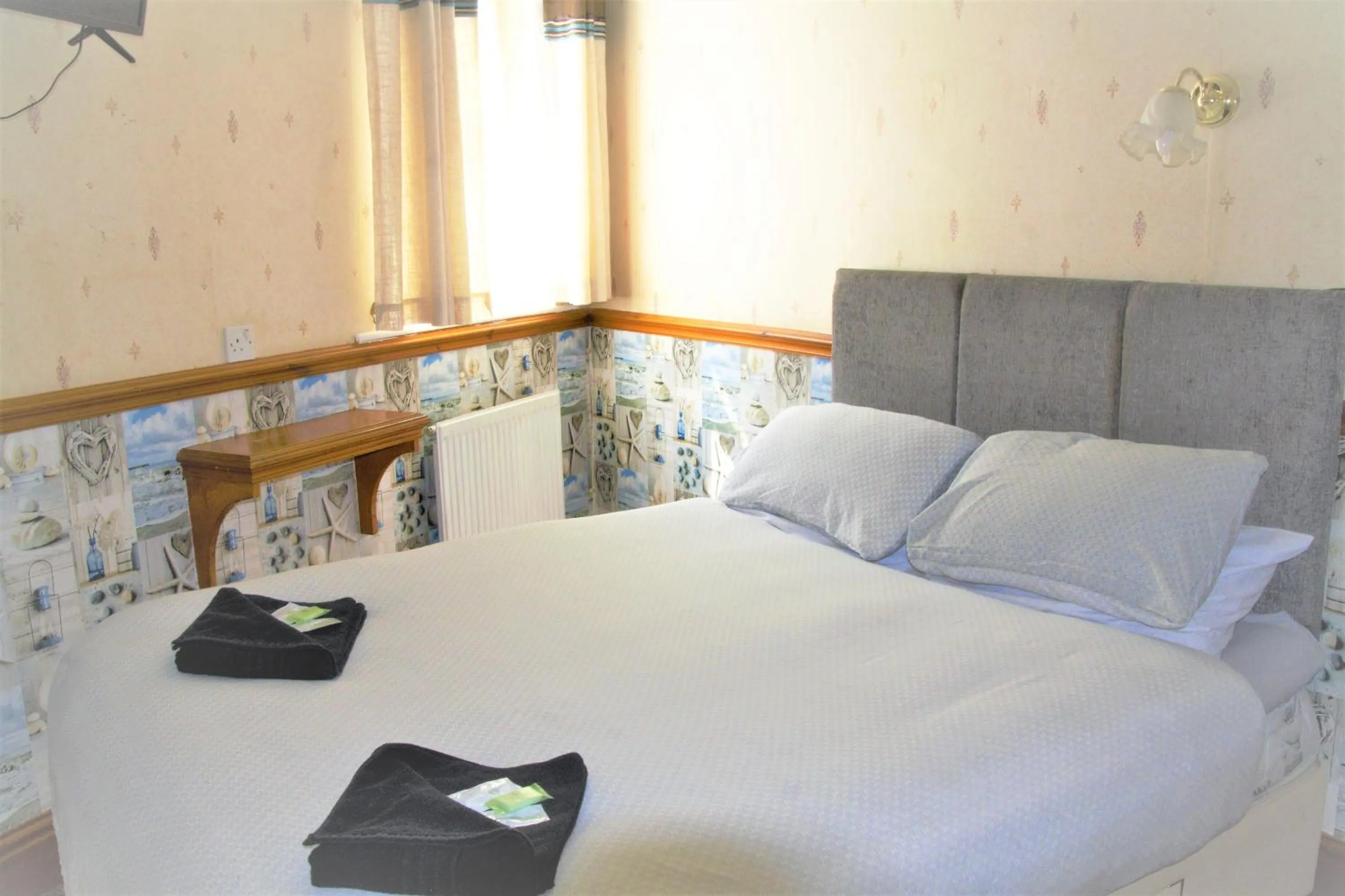 Bed in Pine Lodge Hotel