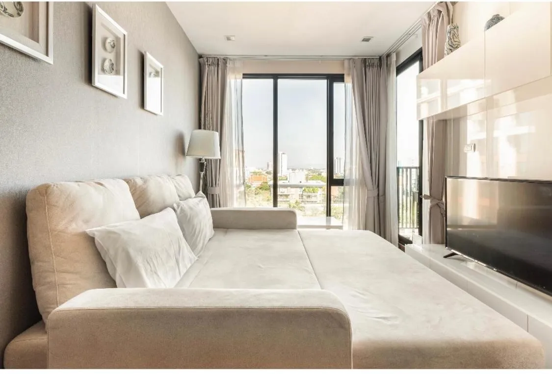 Bed in The Astra Chiang Mai Luxury Condo