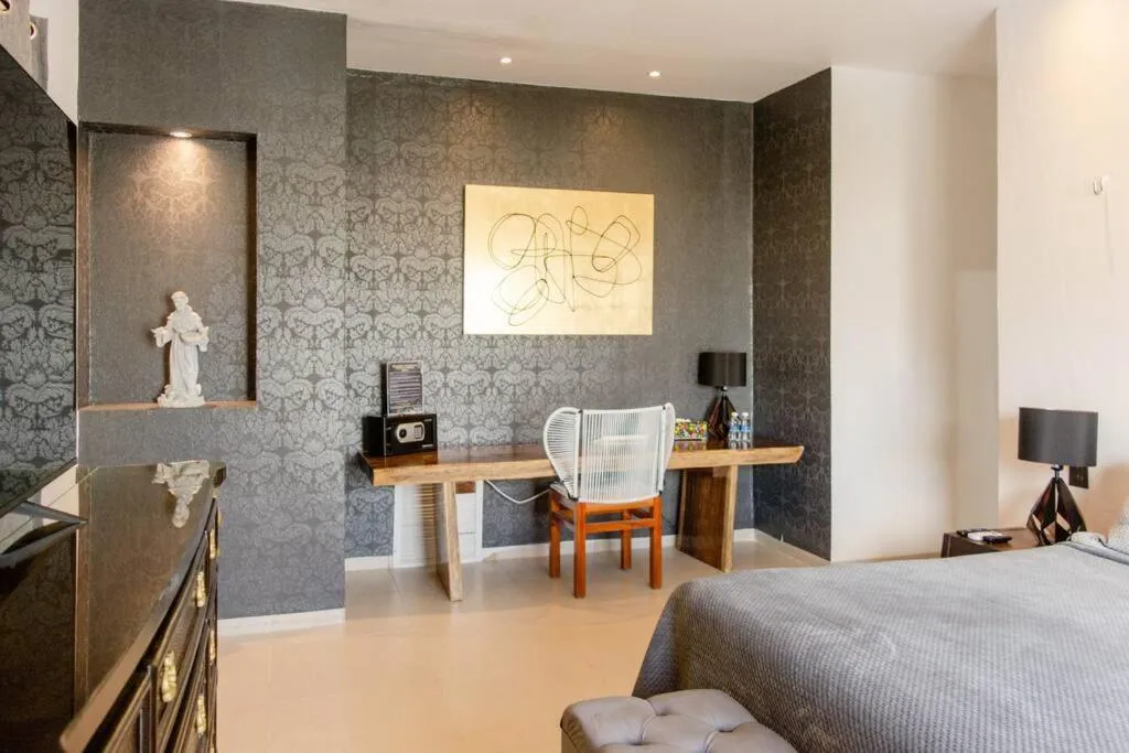 Bed in Hermoso Penthouse Rooftop con alberca