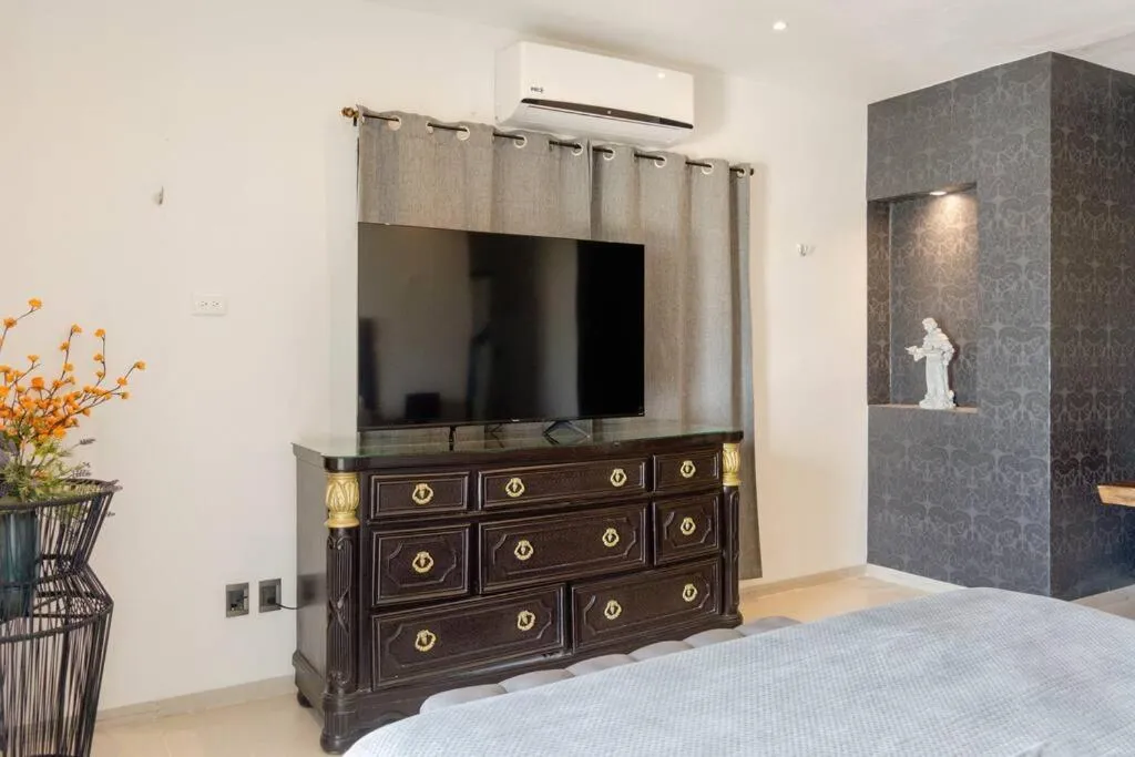 Bed in Hermoso Penthouse Rooftop con alberca