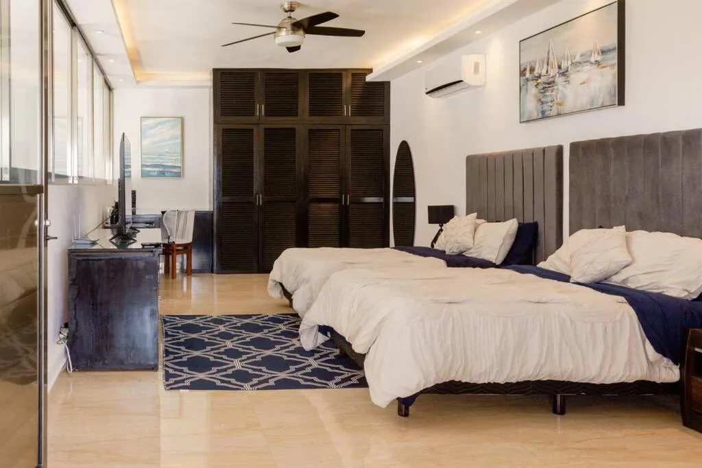 Bed in Hermoso Penthouse Rooftop con alberca