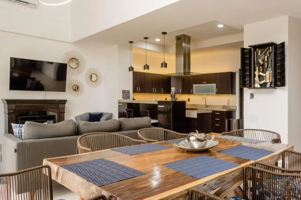 Communal lounge/ TV room in Hermoso Penthouse Rooftop con alberca