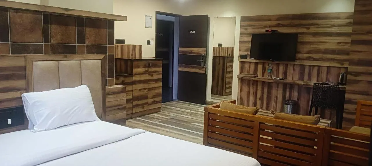 Photo of the whole room, Bed in Laxman Residency