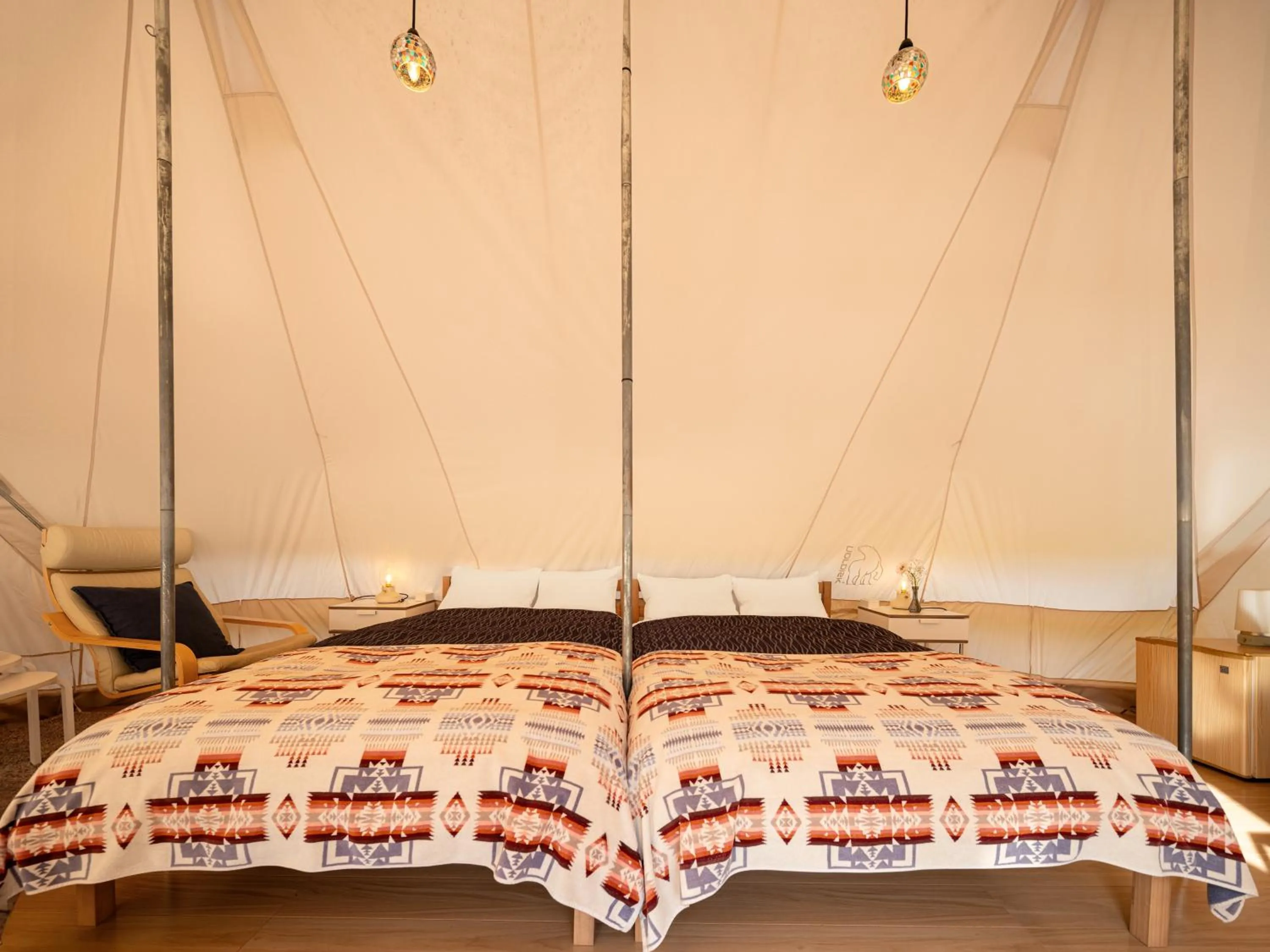 Bed in THE FARM Resort Japan