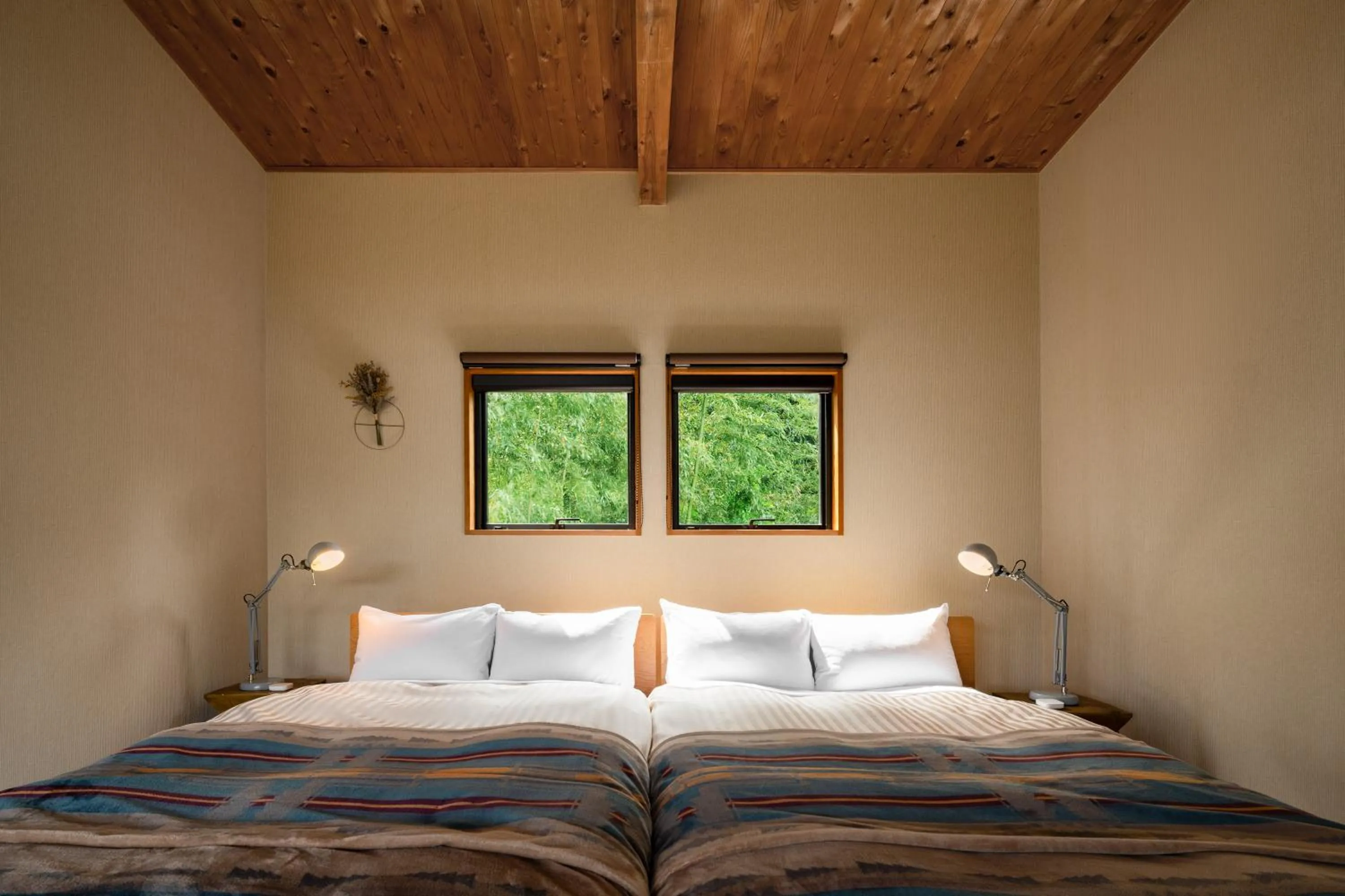 Bed in THE FARM Resort Japan
