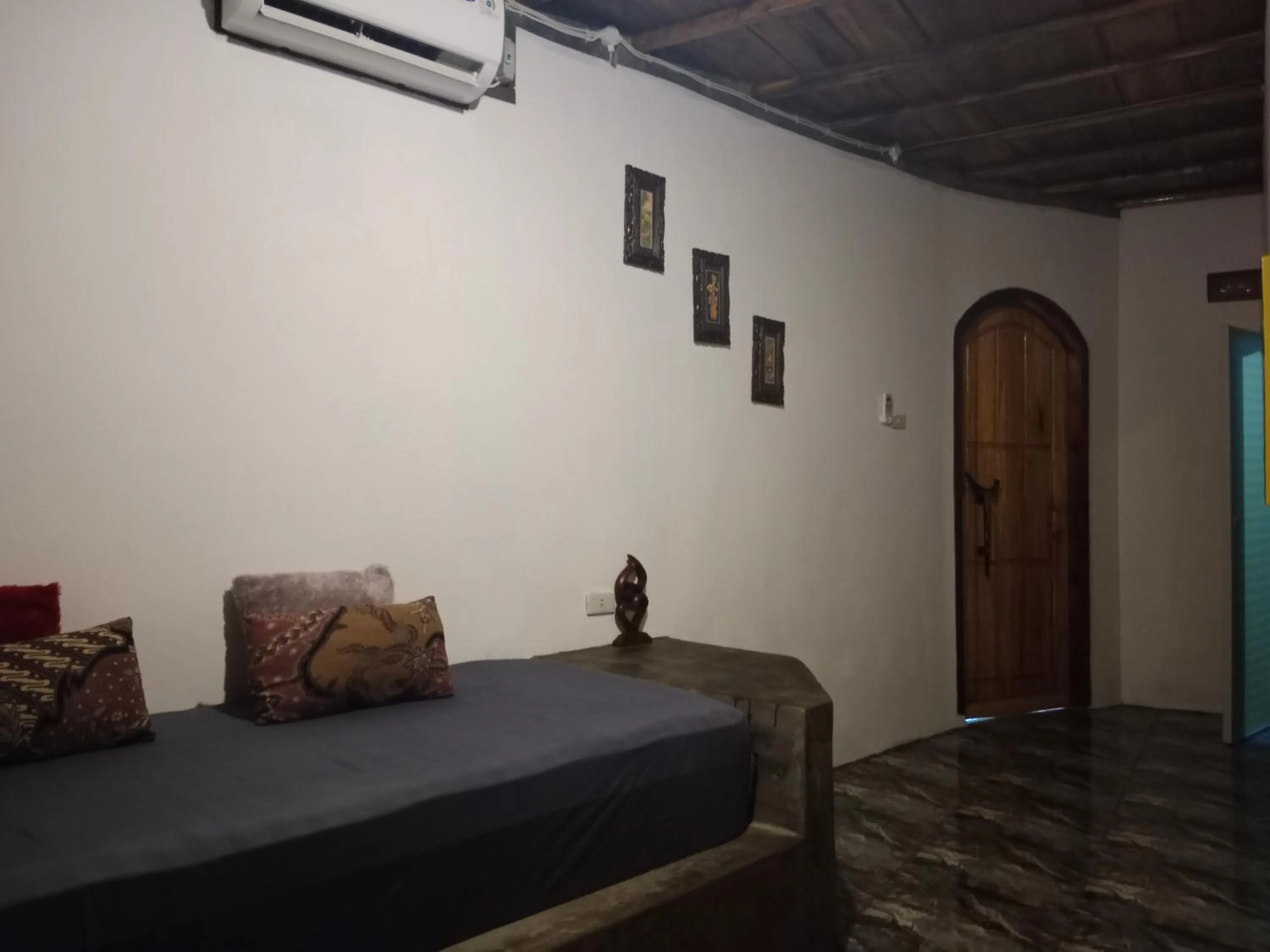 Bed in Rumah Nalu surf camp