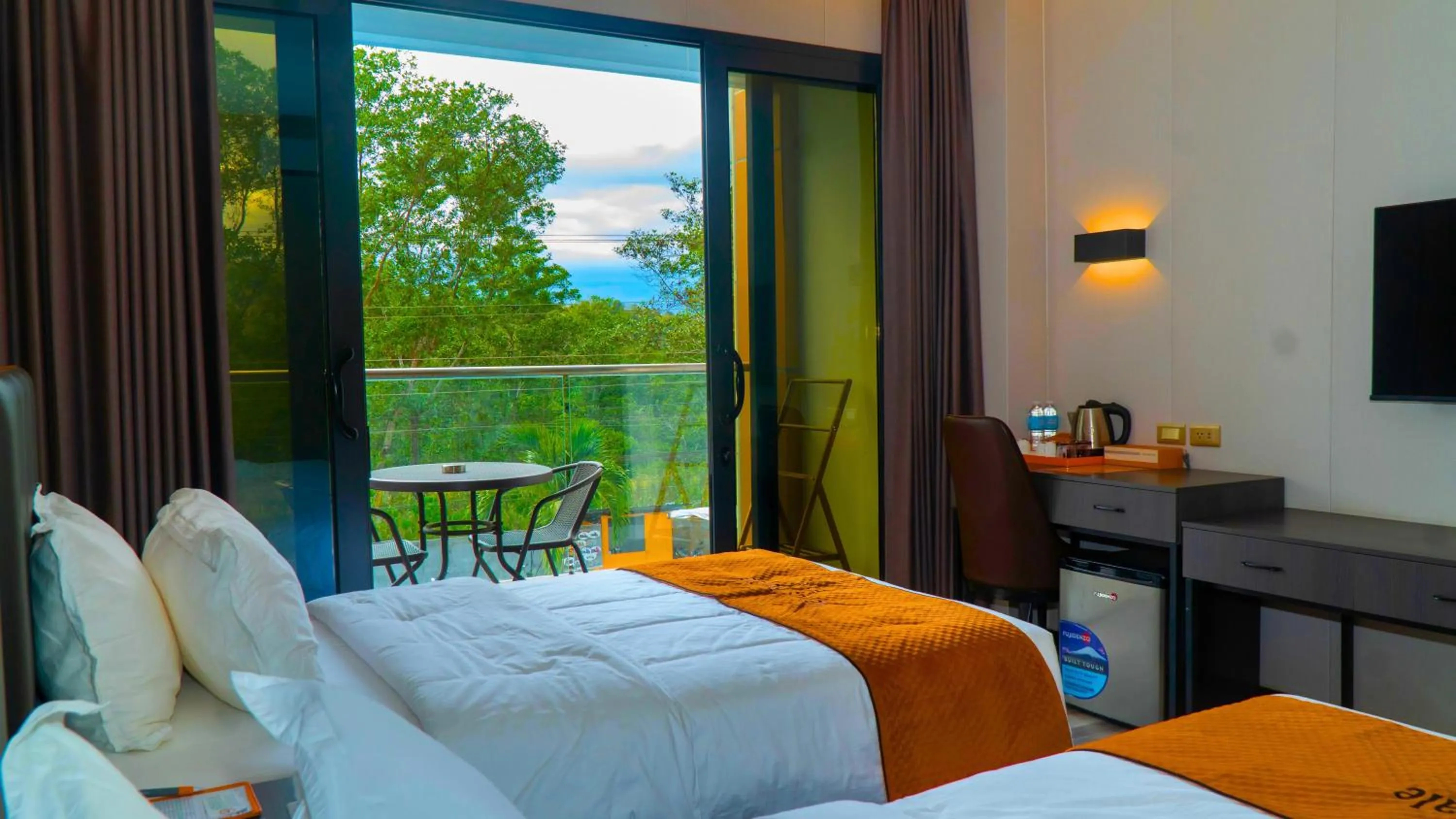 Bed in Venus Royale Hotel