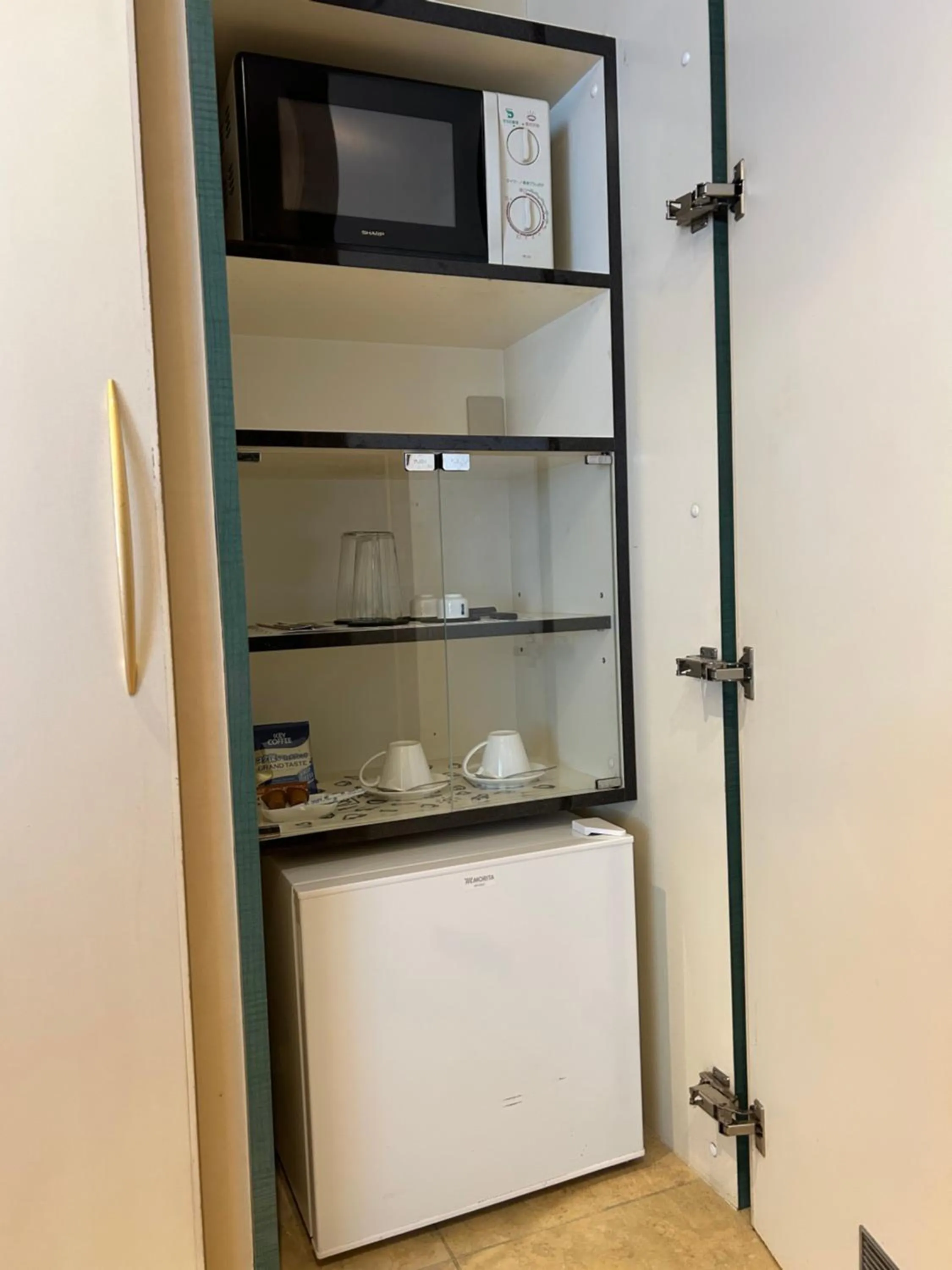 Kitchen or kitchenette in Hotel Takao Asile