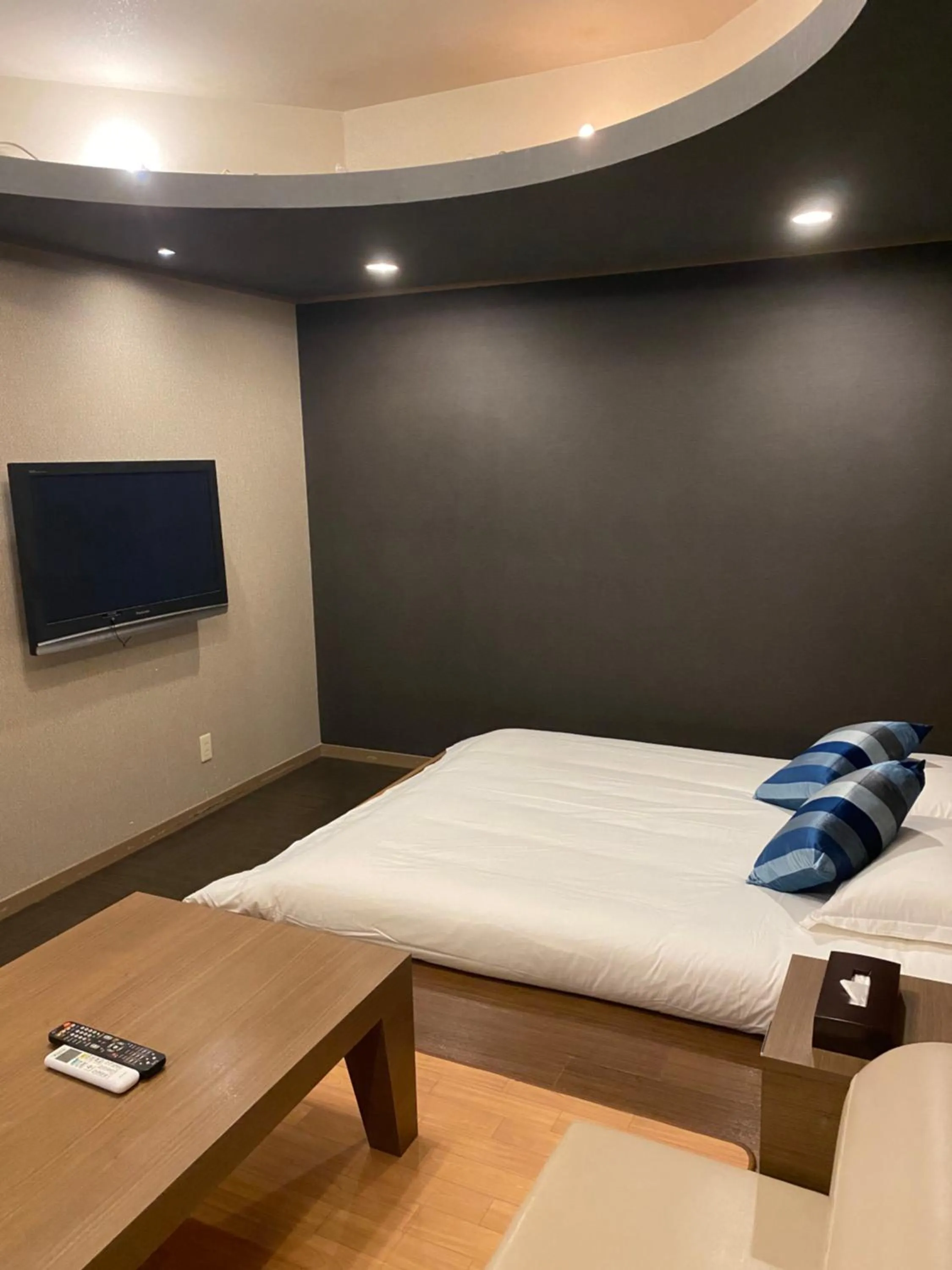 Bed in Hotel Takao Asile