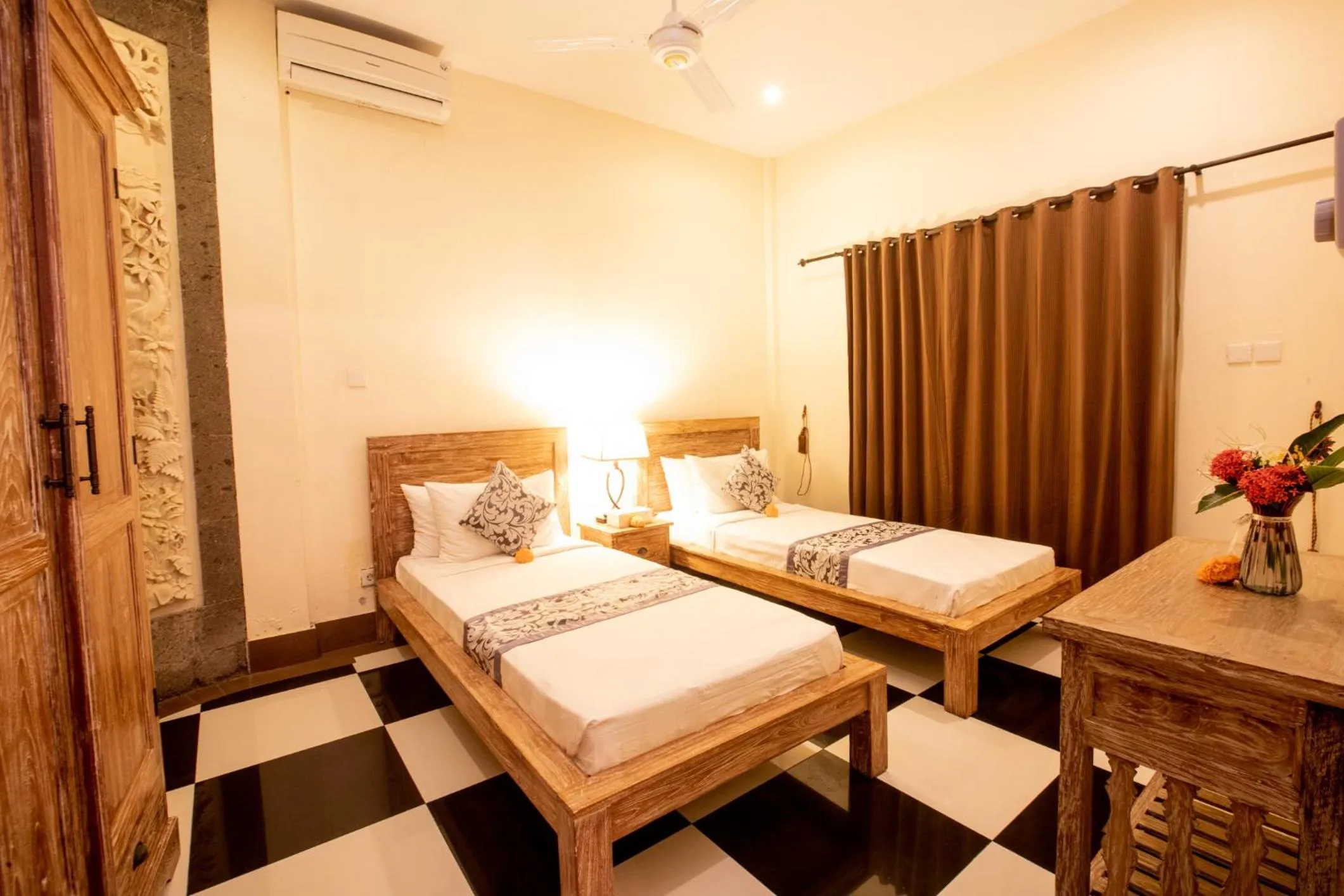 Bed in Arbathu Villa Ubud