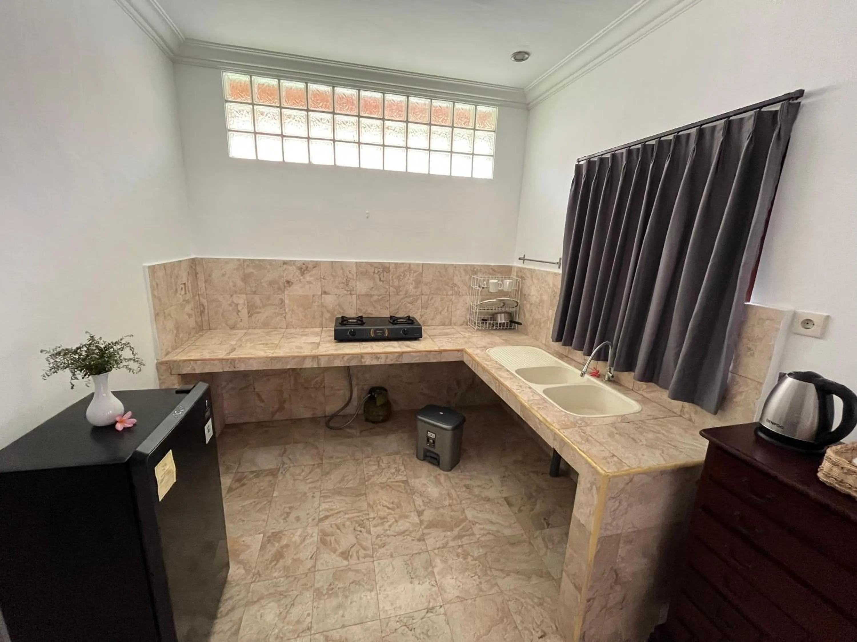 kitchen in Arbathu Villa Ubud