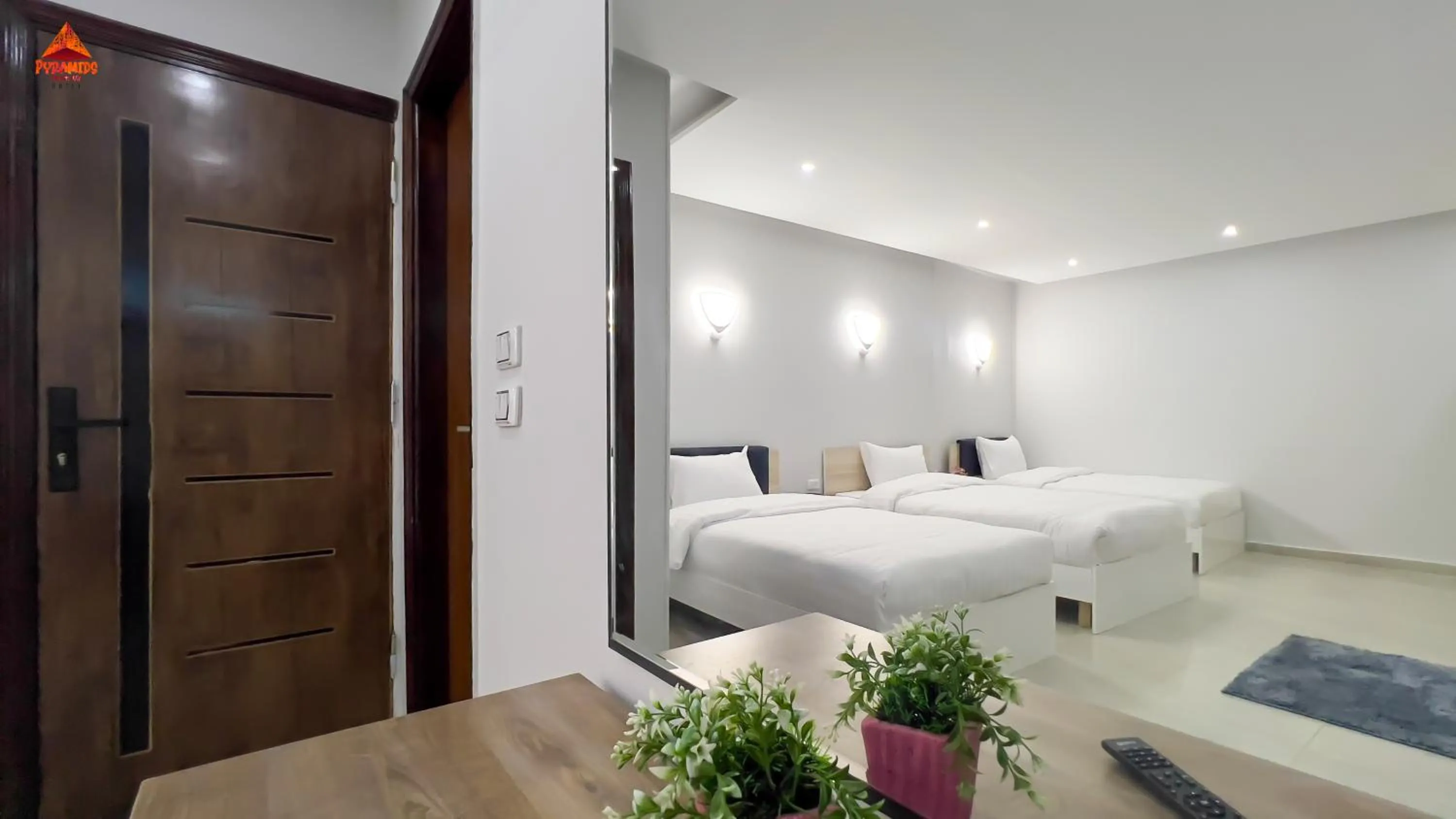 Bed in pyramids tower view inn