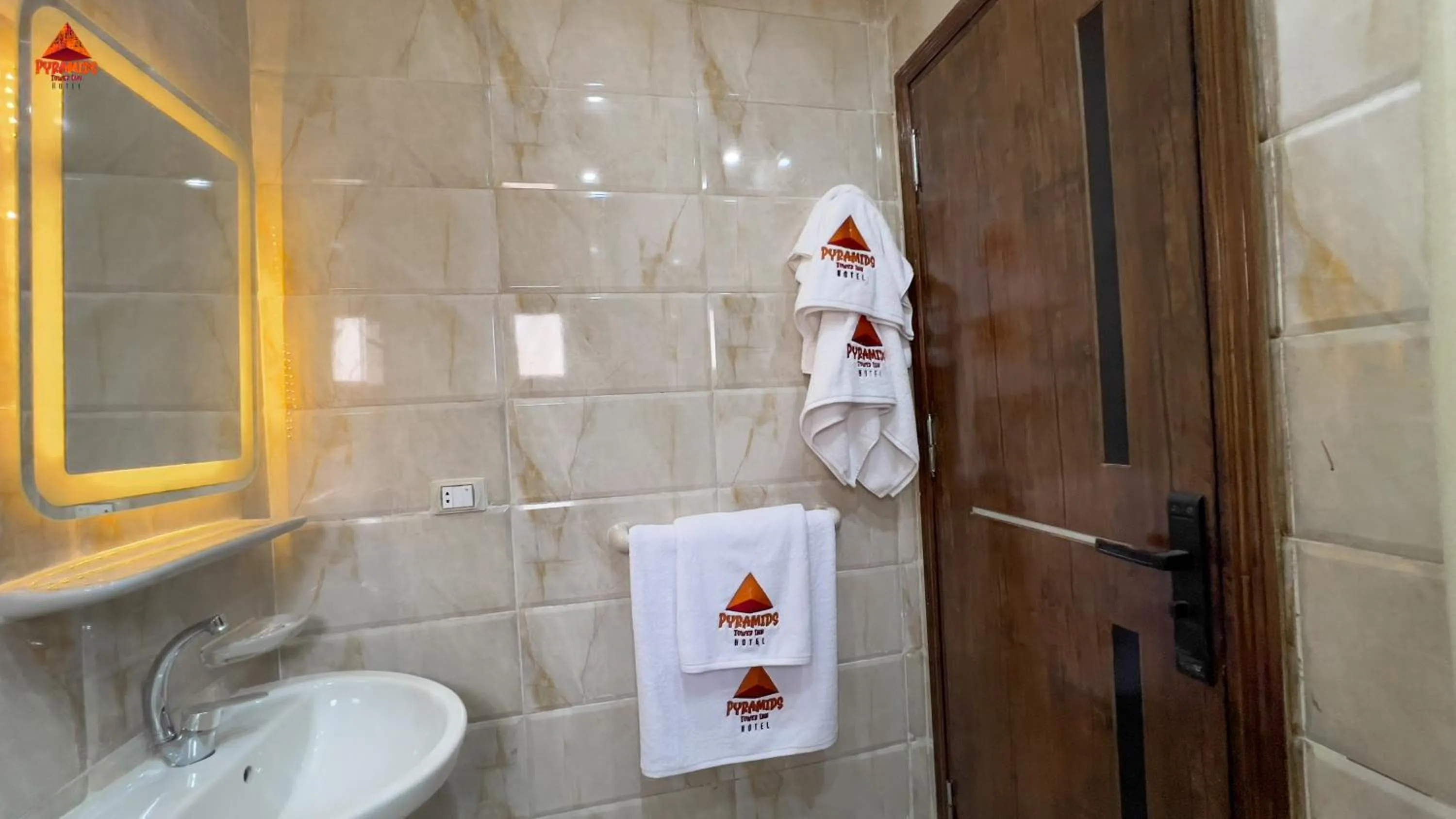 Shower in pyramids tower view inn