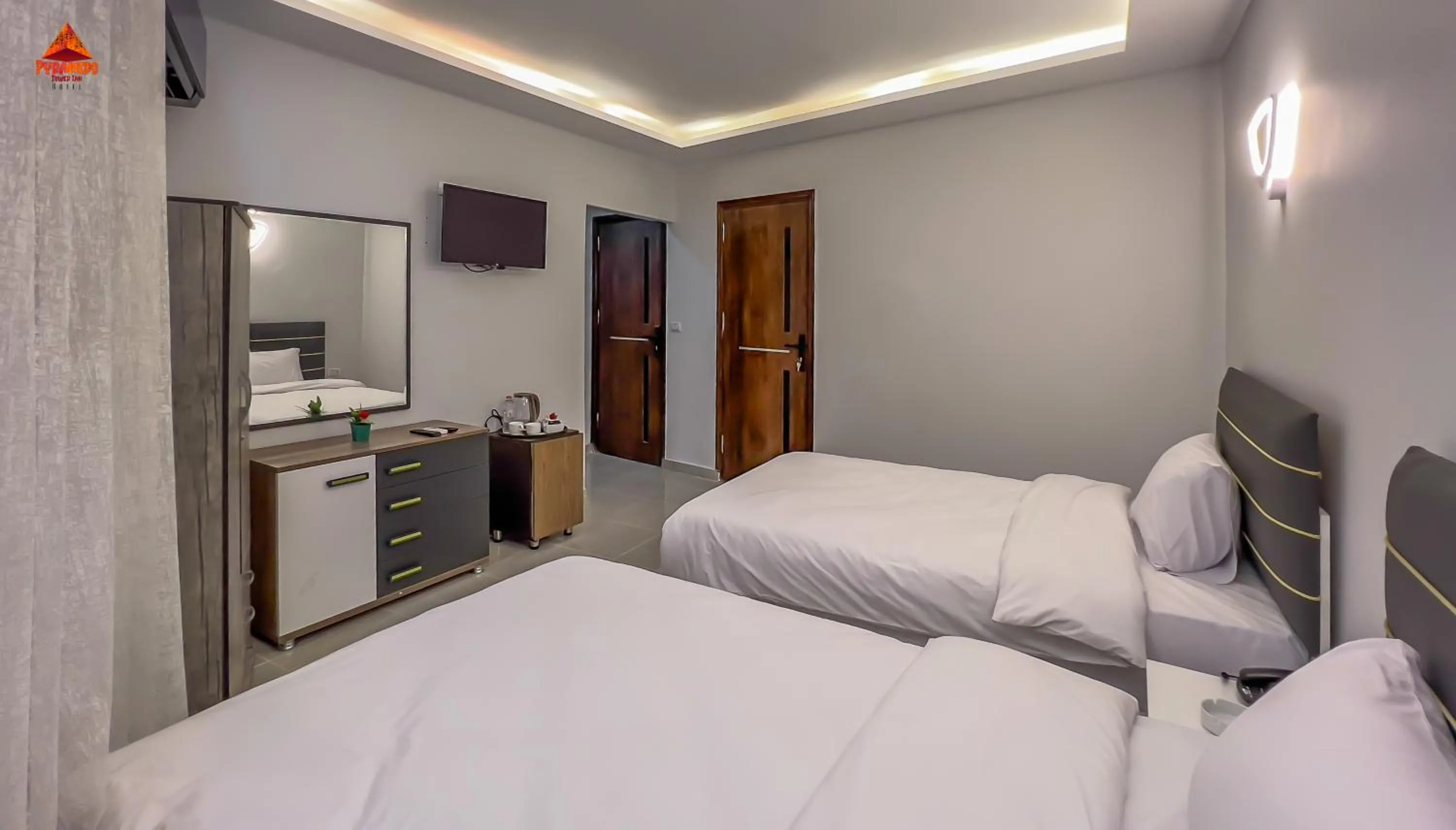 Bed in pyramids tower view inn